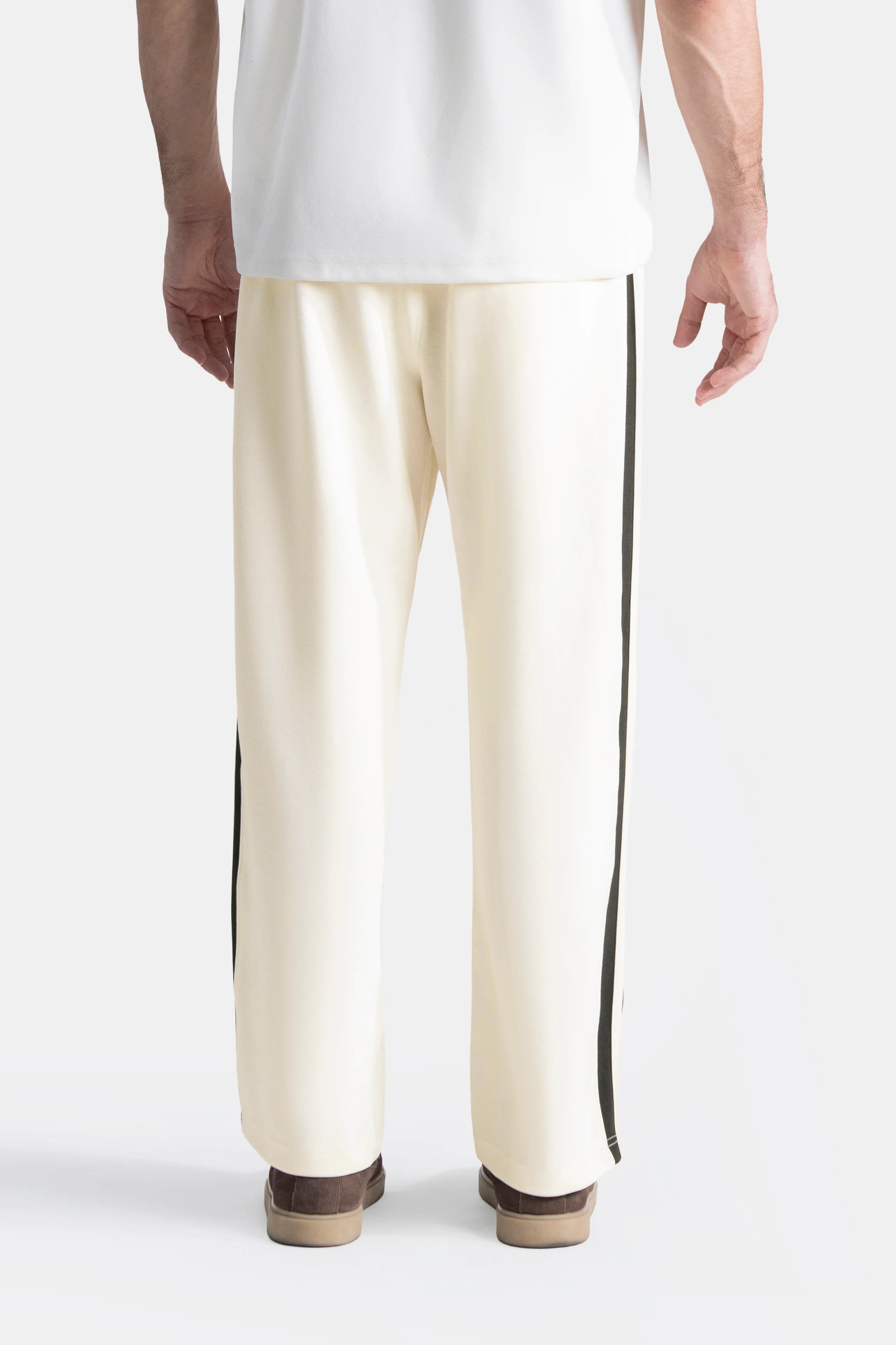 Off-white drawstring trousers with black side seam stripe