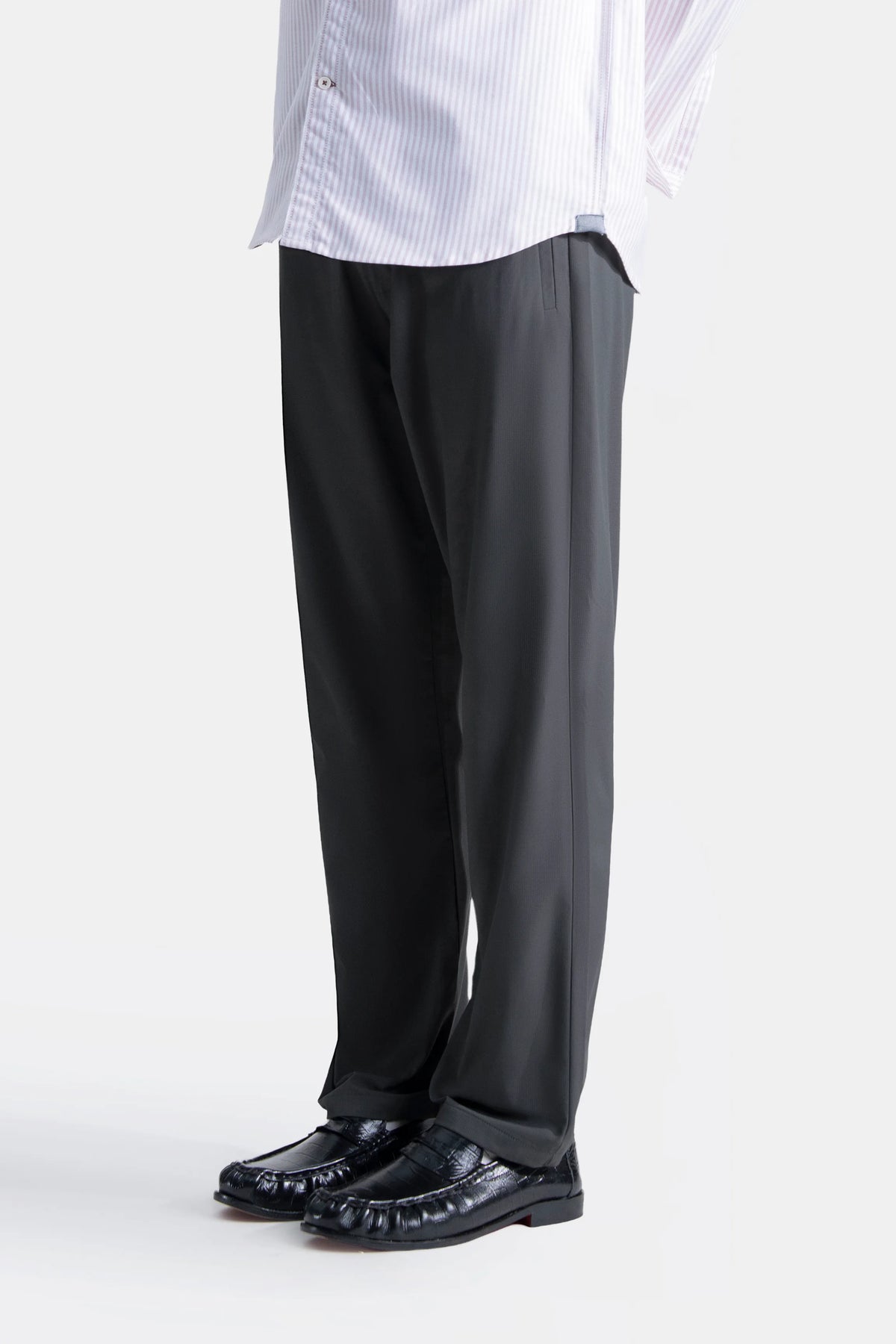 Straight-fit casual trousers in dark grey, side view with front crease