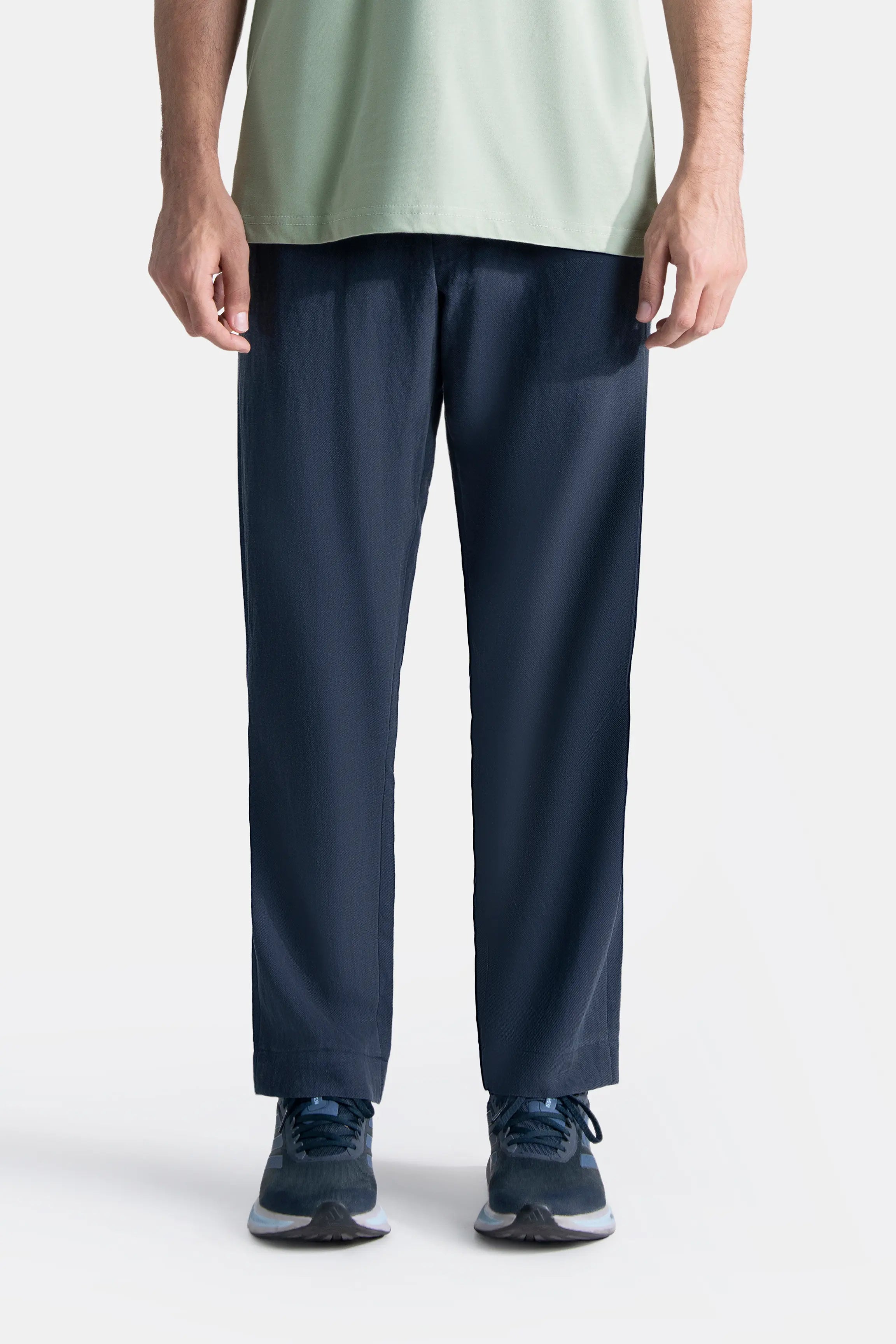 Navy straight-fit pants with front cross pocket detail