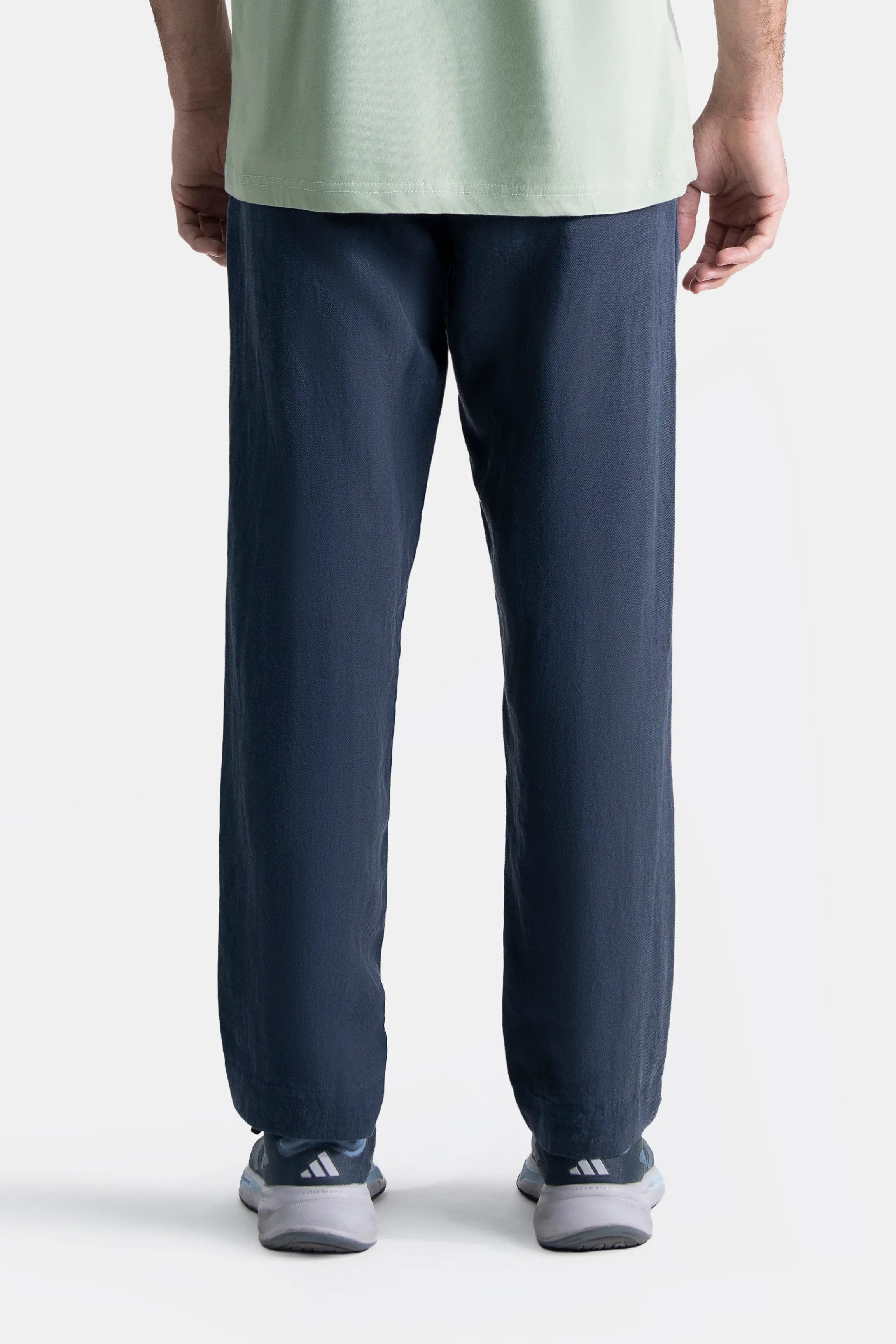 Navy straight-fit pants with elastic waistband and straight legs