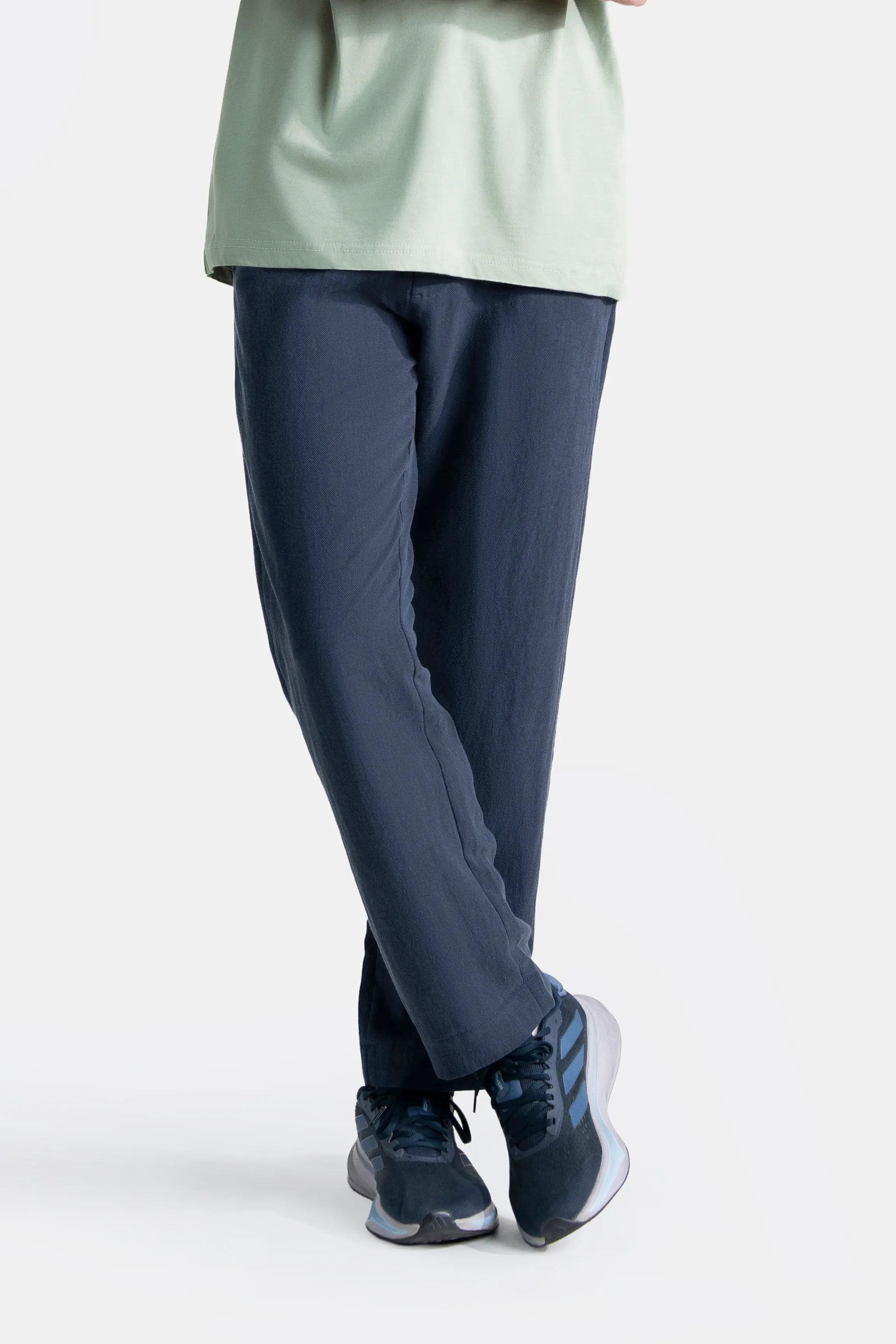 Navy straight-fit pants with roomy straight silhouette and ankle-length hem