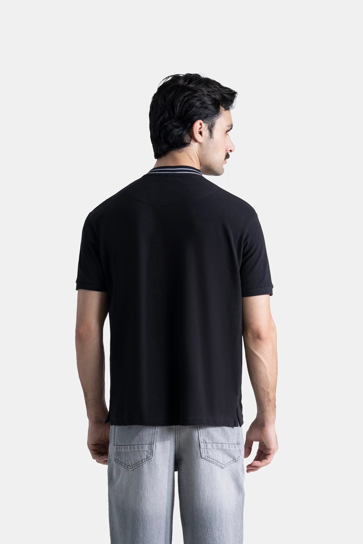 Black short-sleeve henley shirt, back view, clean yoke and button collar