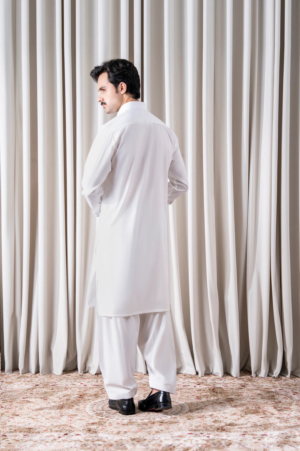 White textured kameez shalwar set with long tunic and full-length back view
