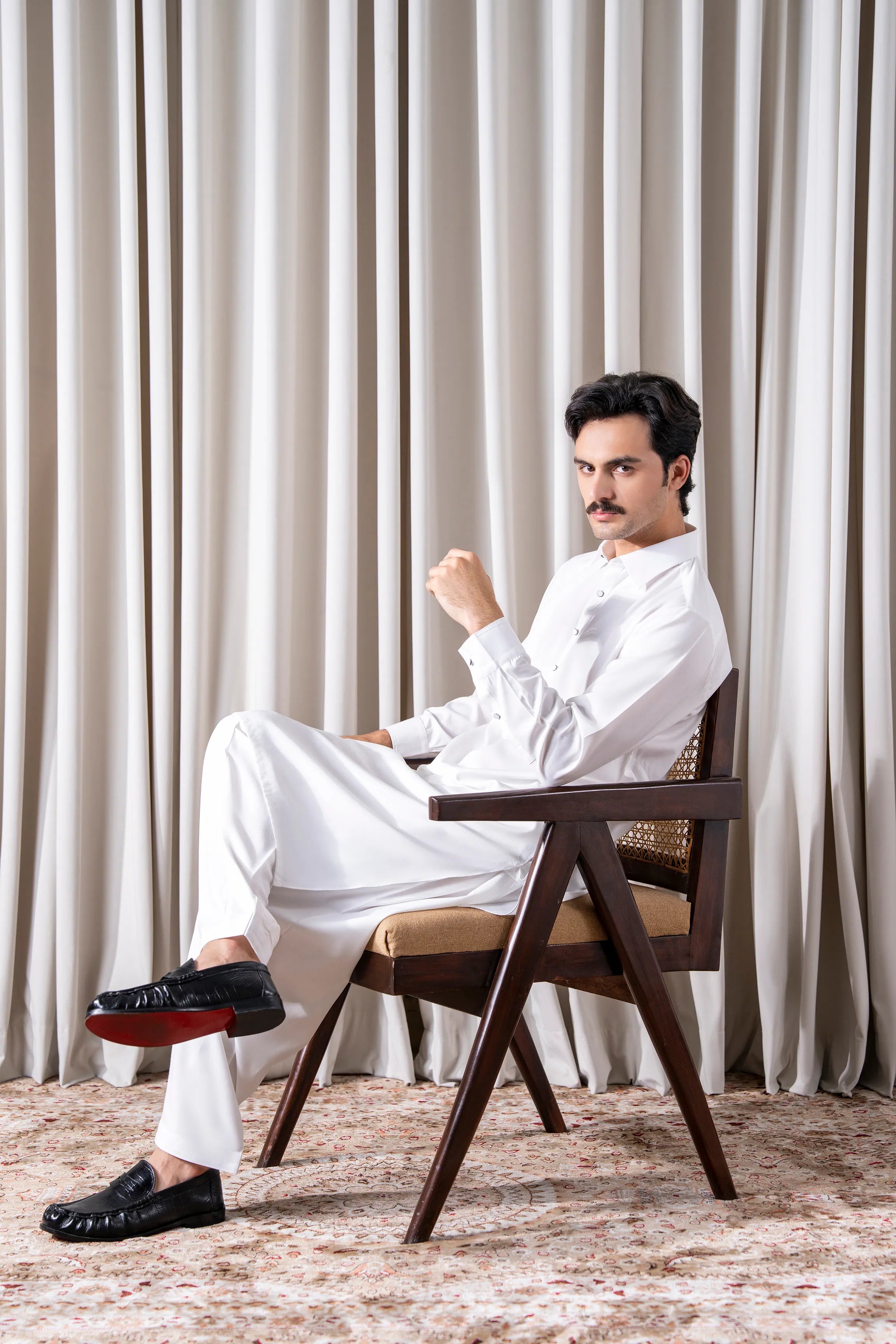 White textured kameez shalwar set with loose trousers and long sleeves