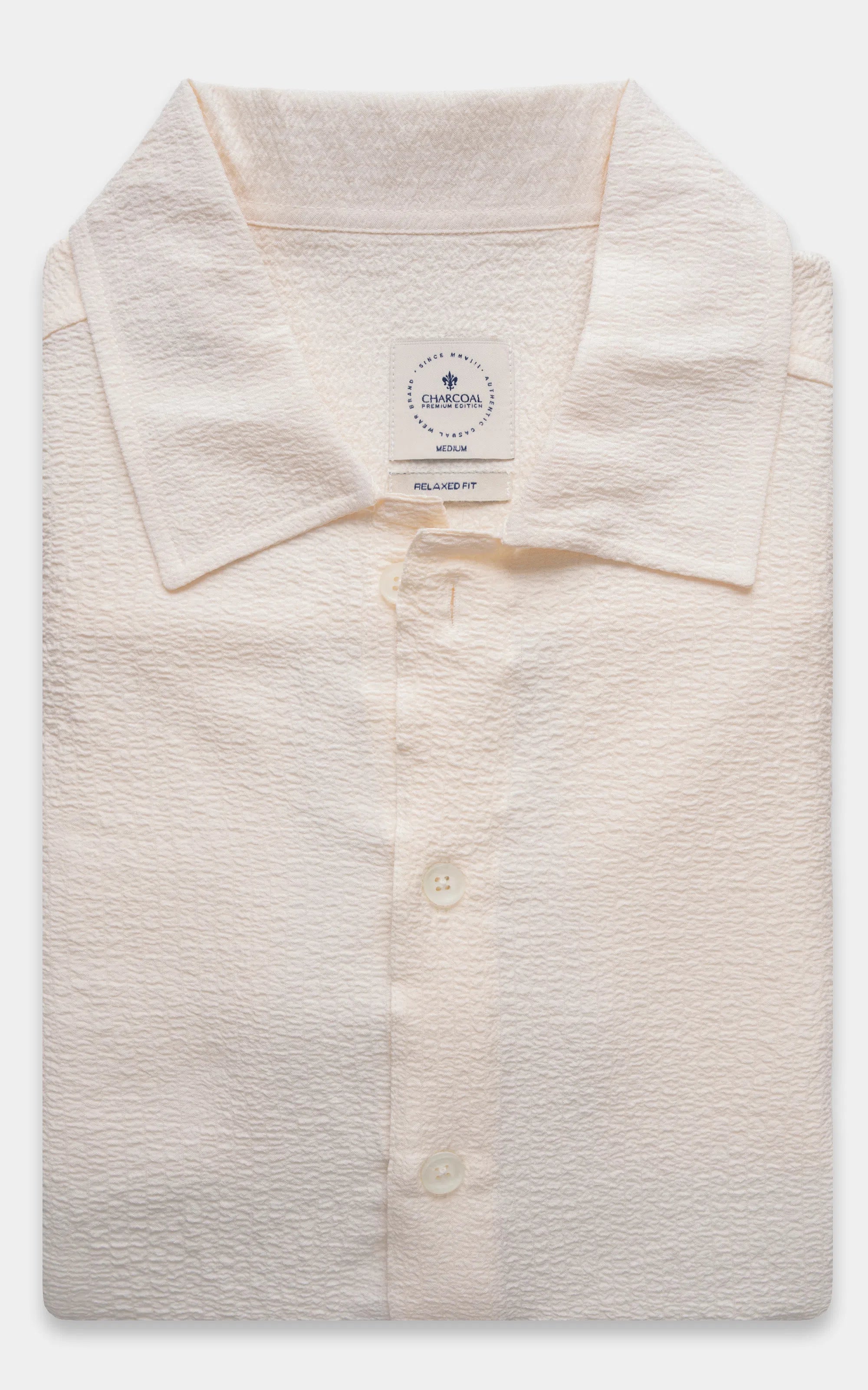 Off-white relaxed-fit shirt with spread collar and button placket