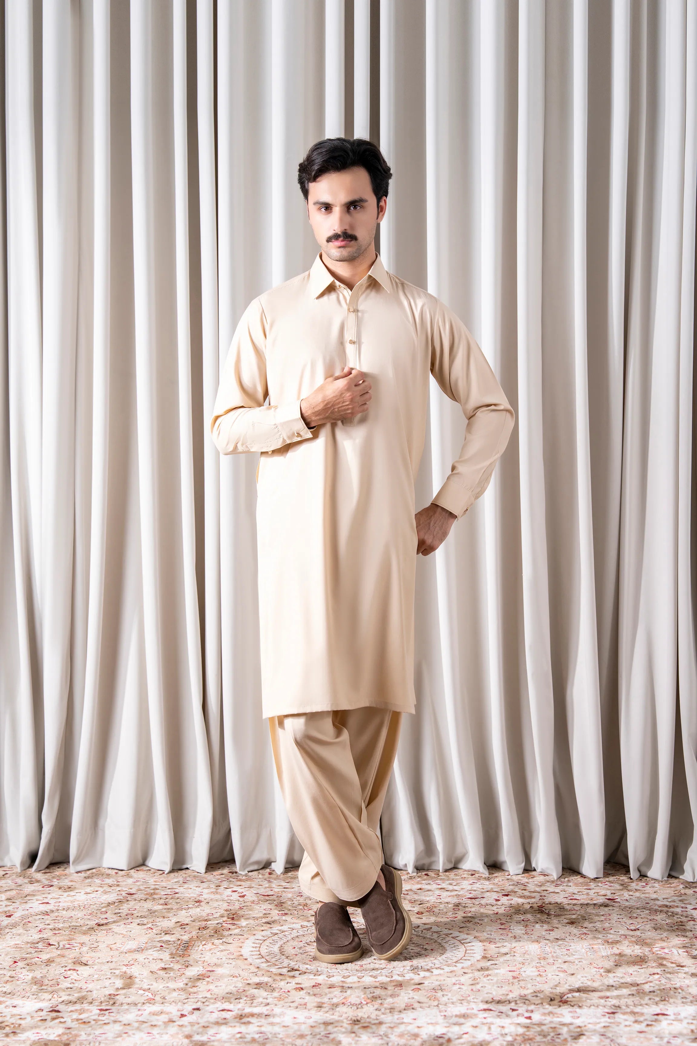 Beige textured blended kameez and shalwar set with buttoned collar and long tunic