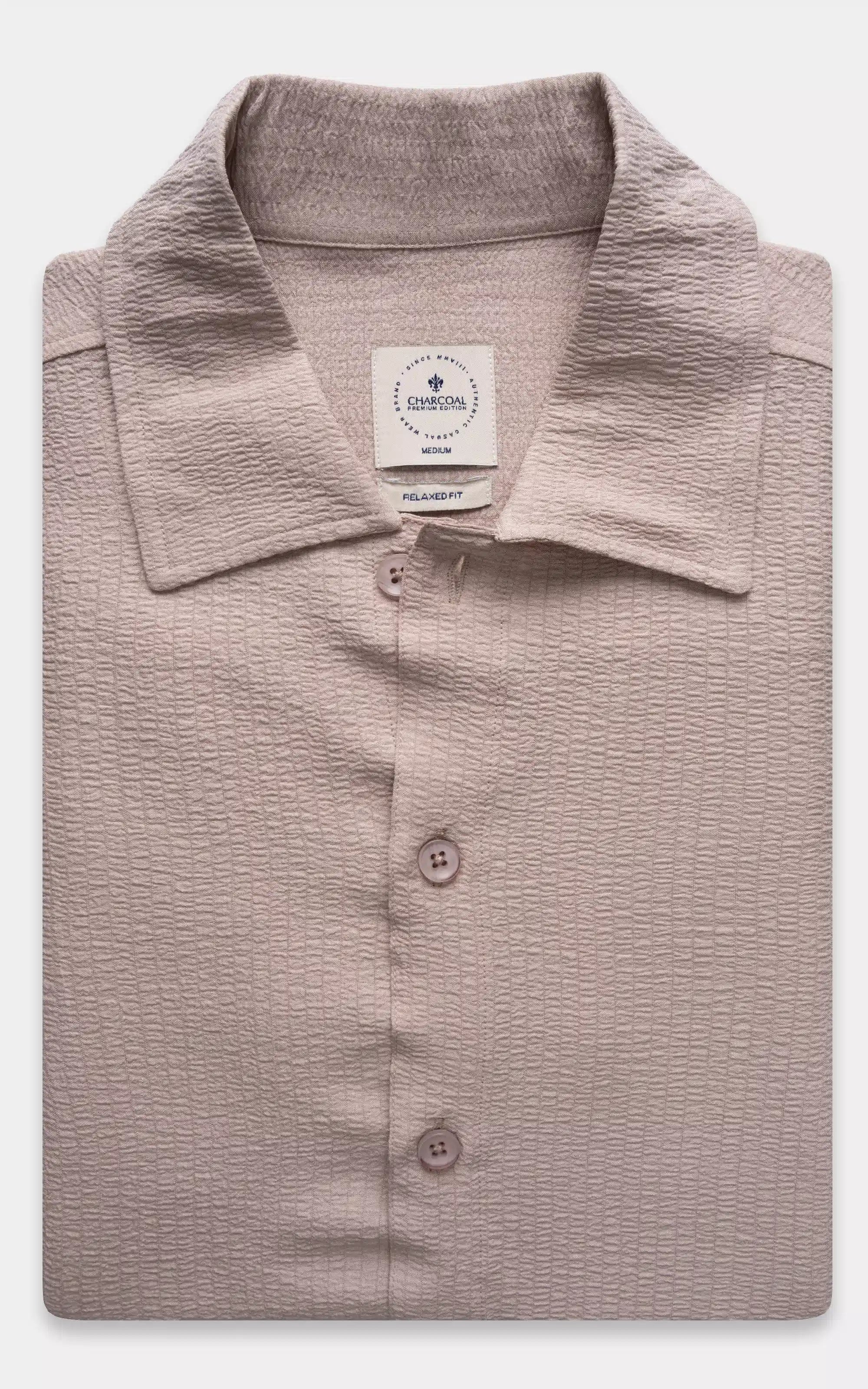 Relaxed-fit khaki button-up shirt with pointed collar and button placket