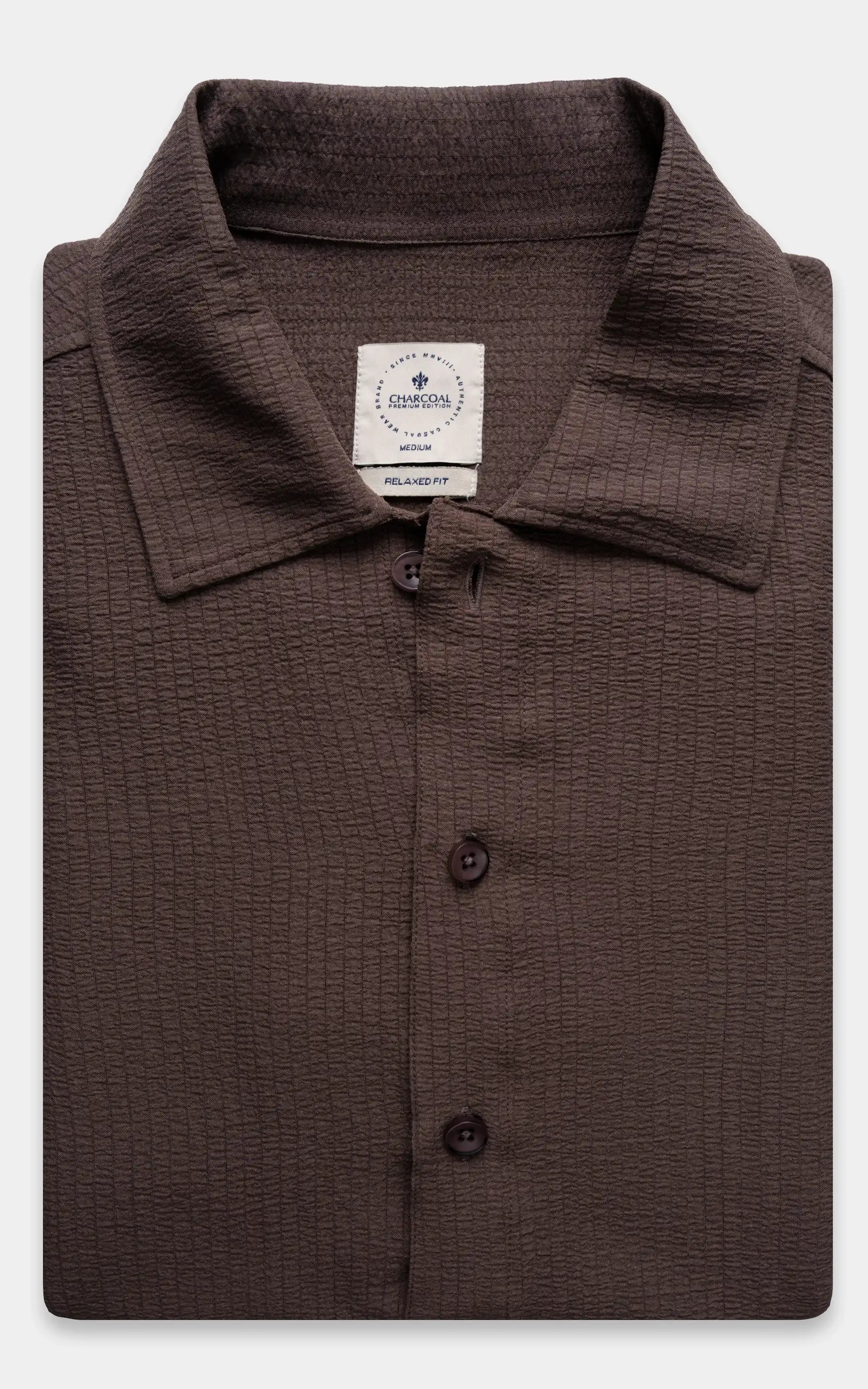 Relaxed-fit brown button-up shirt with spread collar and two-button front placket