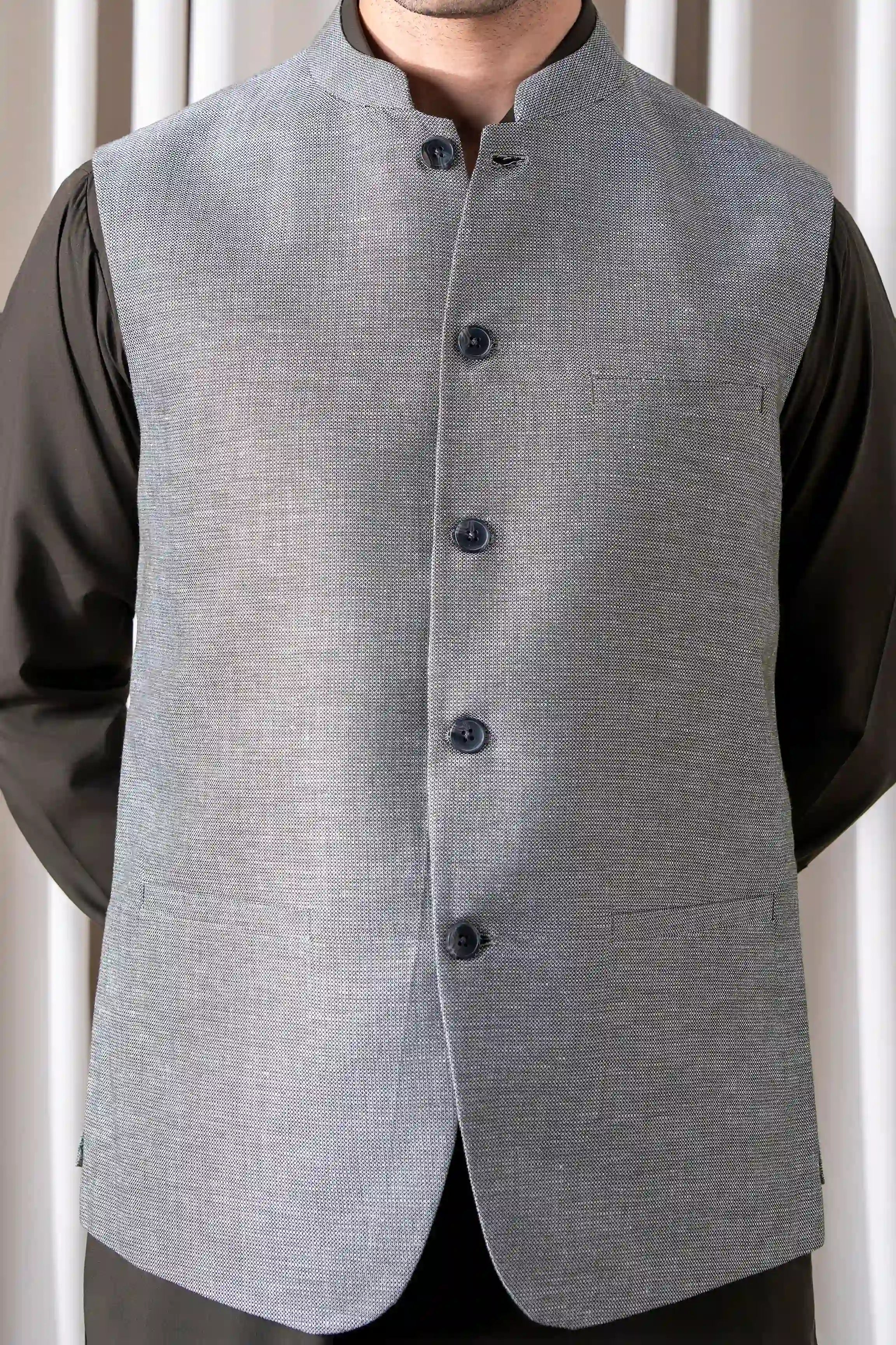 Light gray cotton-linen waistcoat front with stand collar and black button placket