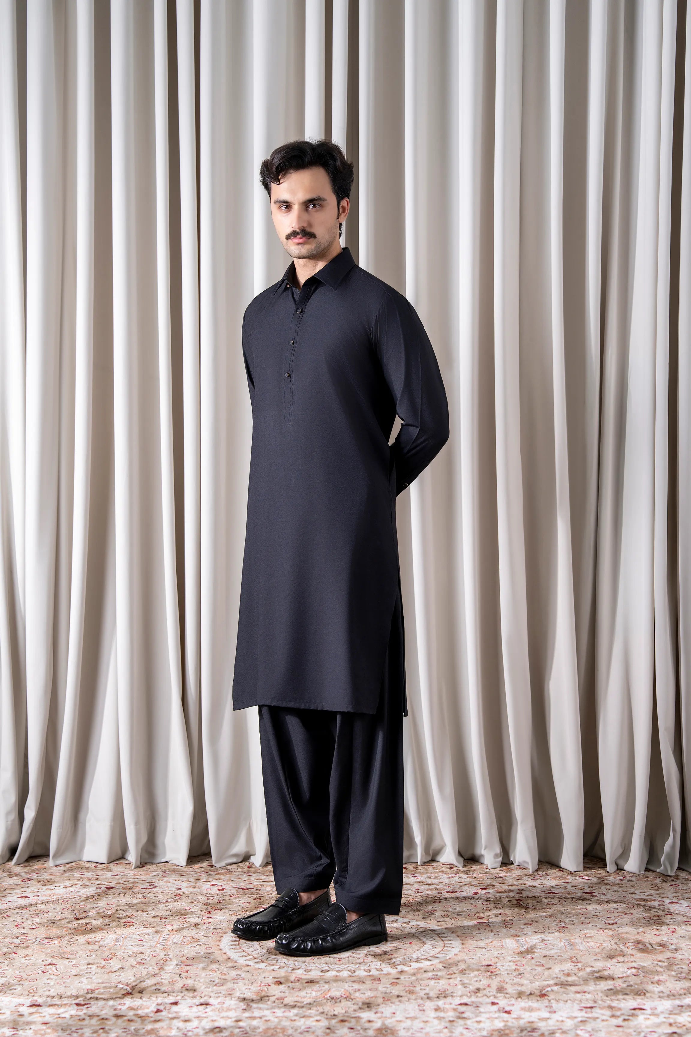 Black textured kameez shalwar set, long buttoned kurta with stand collar, straight shalwar