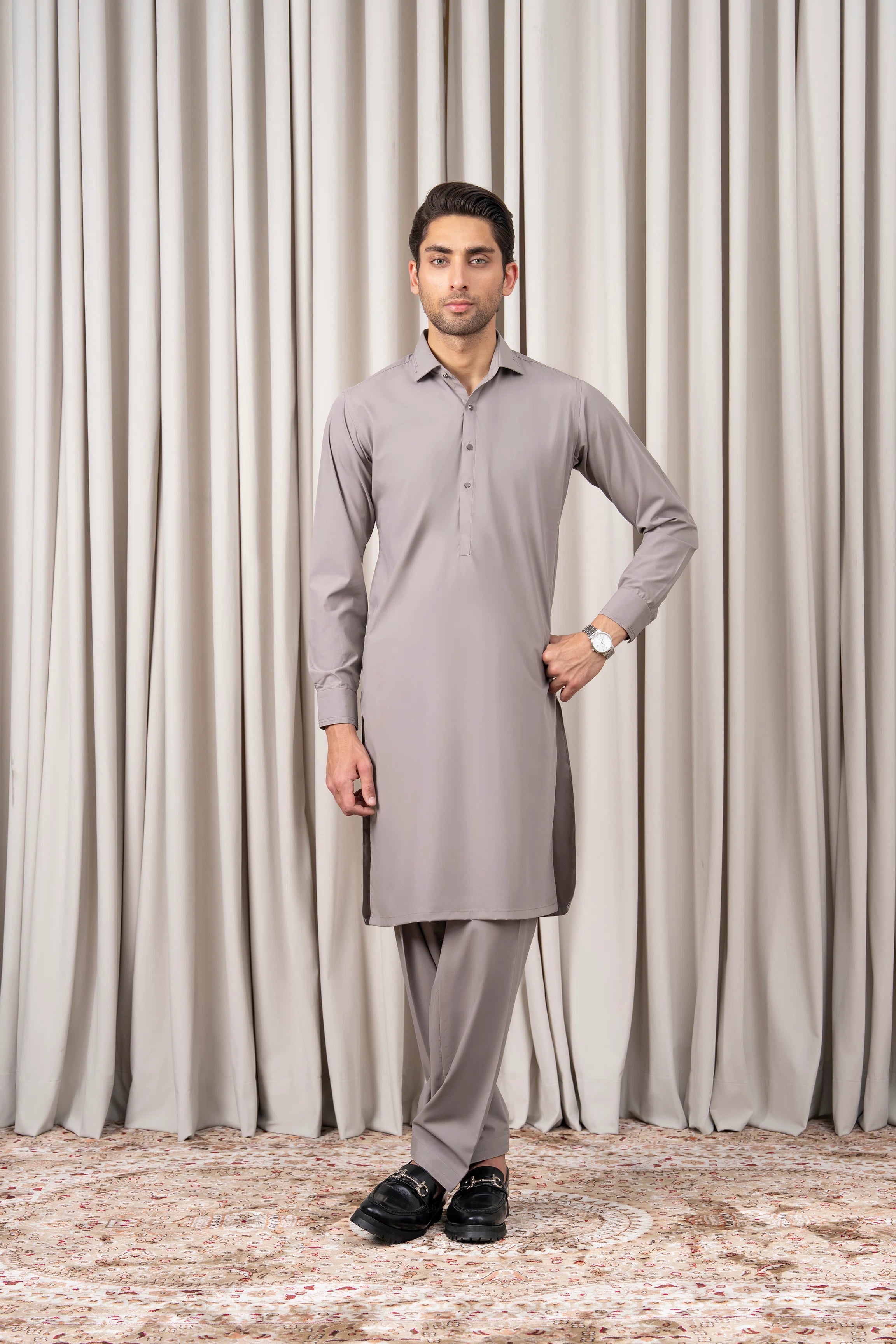 Light grey kameez and shalwar set, button front and long sleeves, full body front view