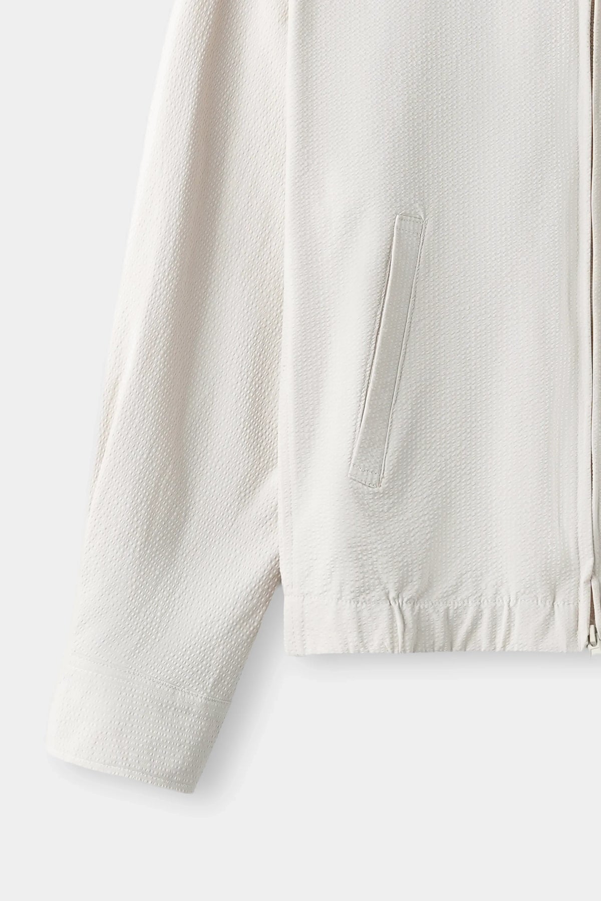Beige seersucker jacket sleeve and hem with front zip detail