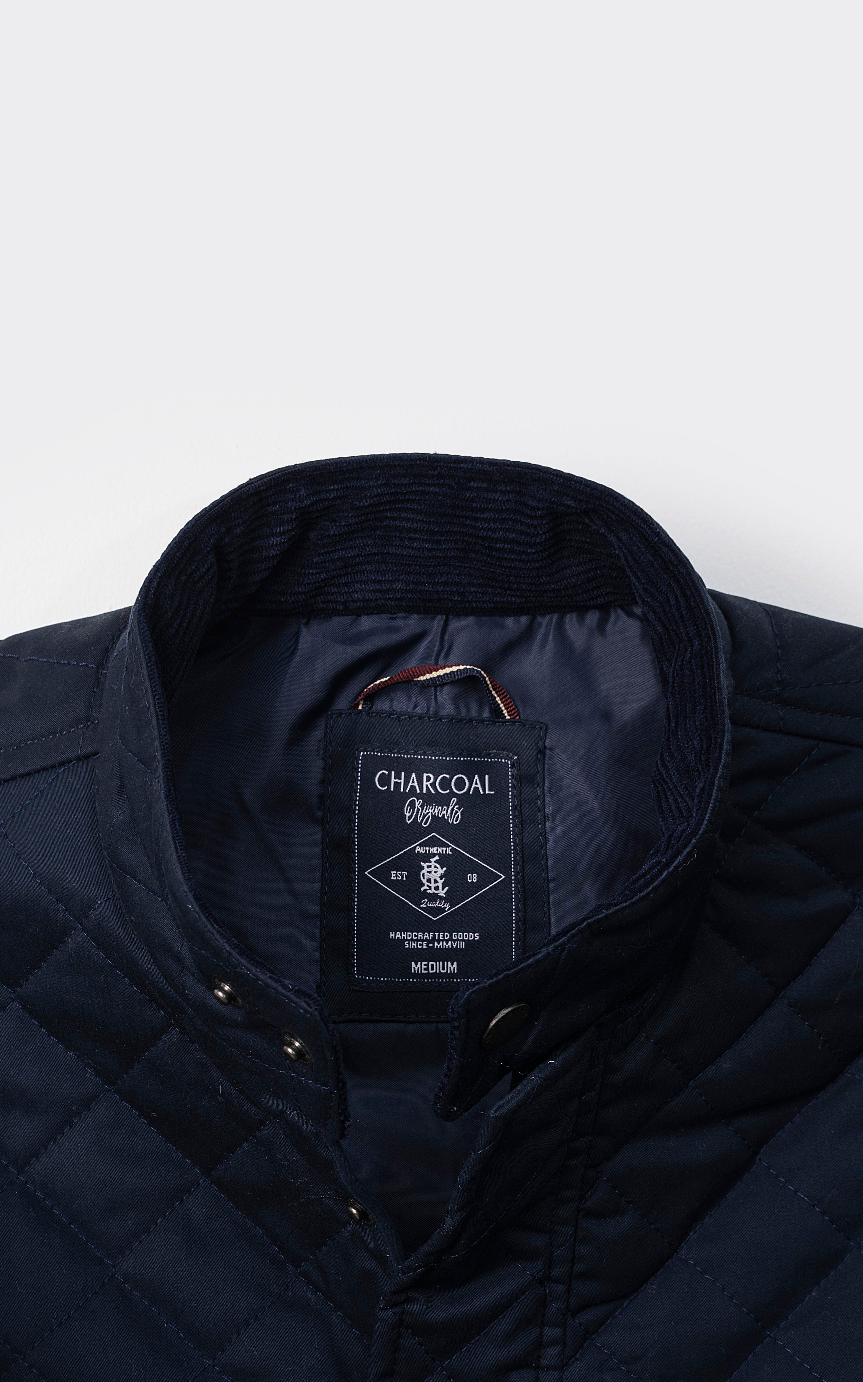 QUILTED SLEEVELESS JACKET NAVY