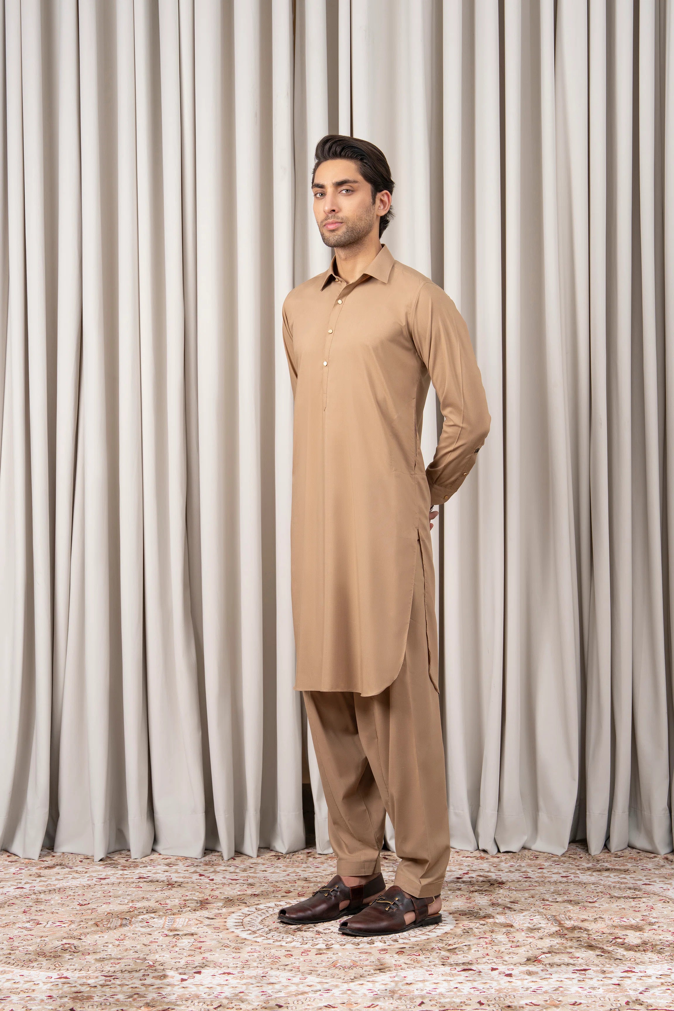 Khaki kameez shalwar set with long tunic and matching trousers, side view