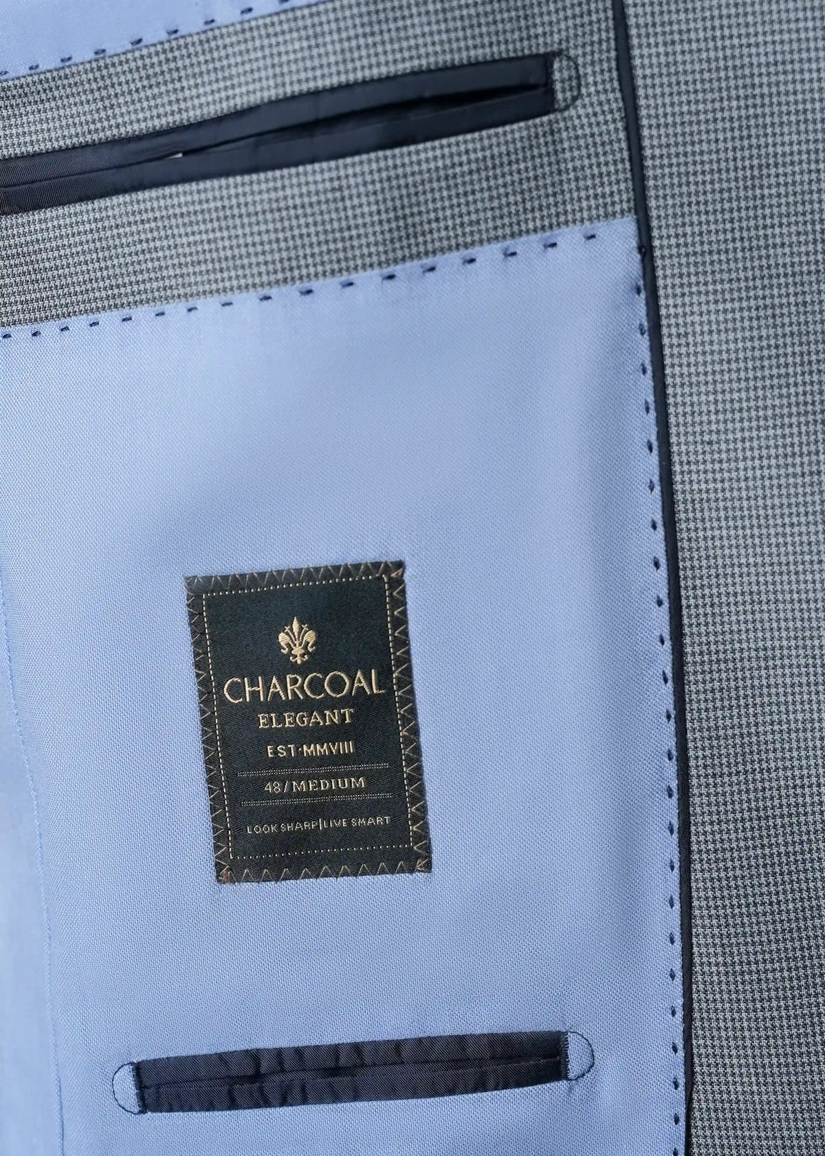 Casual coat interior label and pocket opening with houndstooth detail