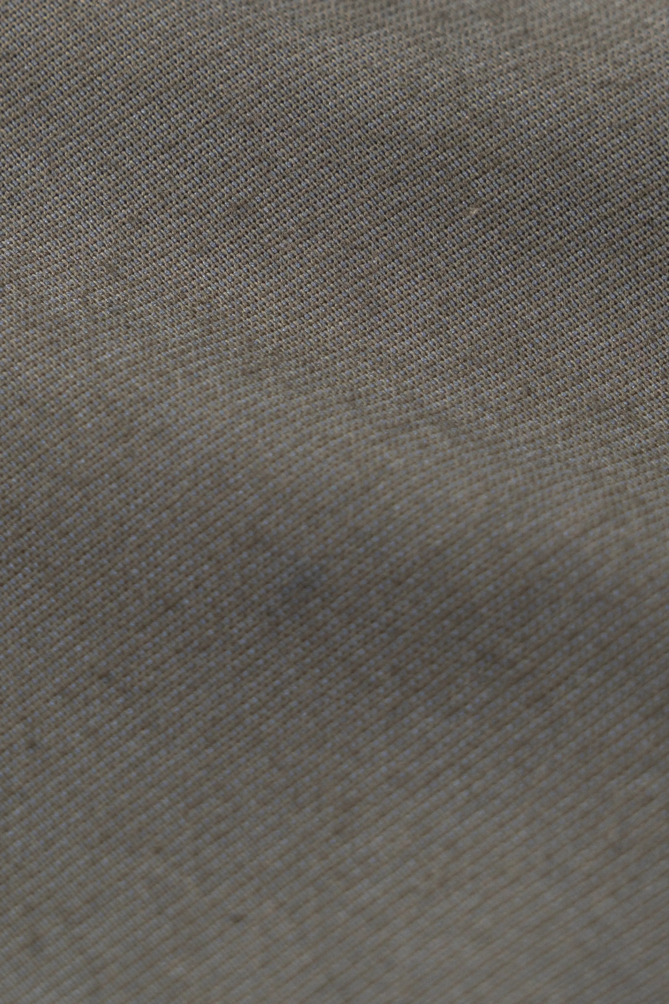 Dark olive-green woven shirt fabric texture