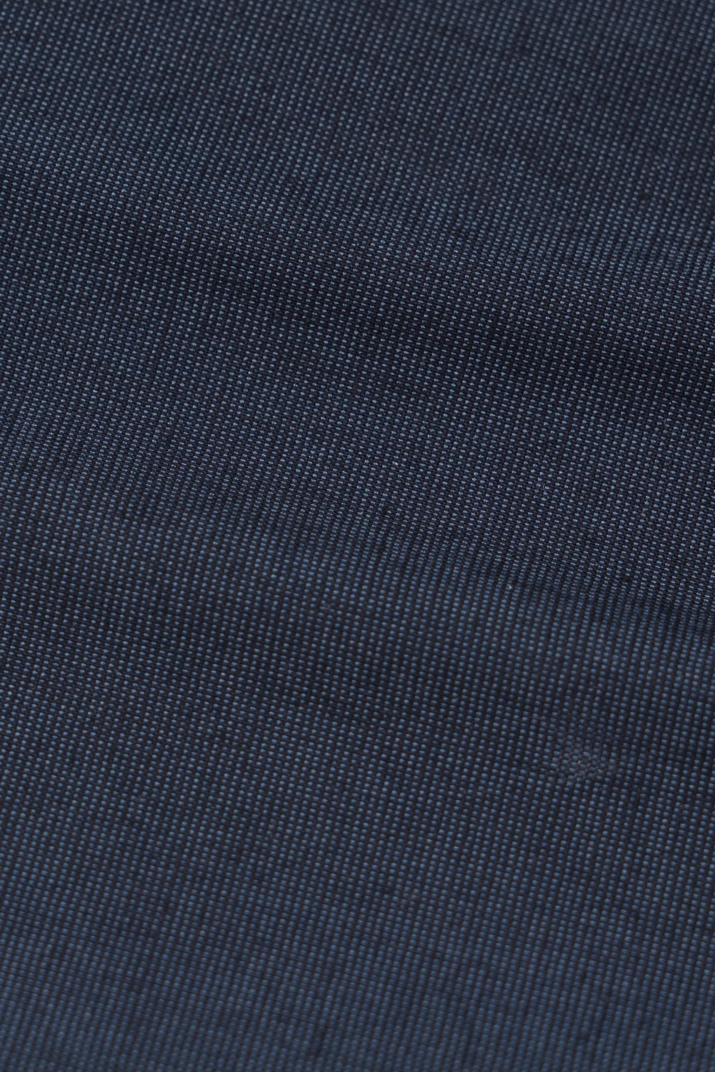Dark blue textured dress shirt fabric swatch