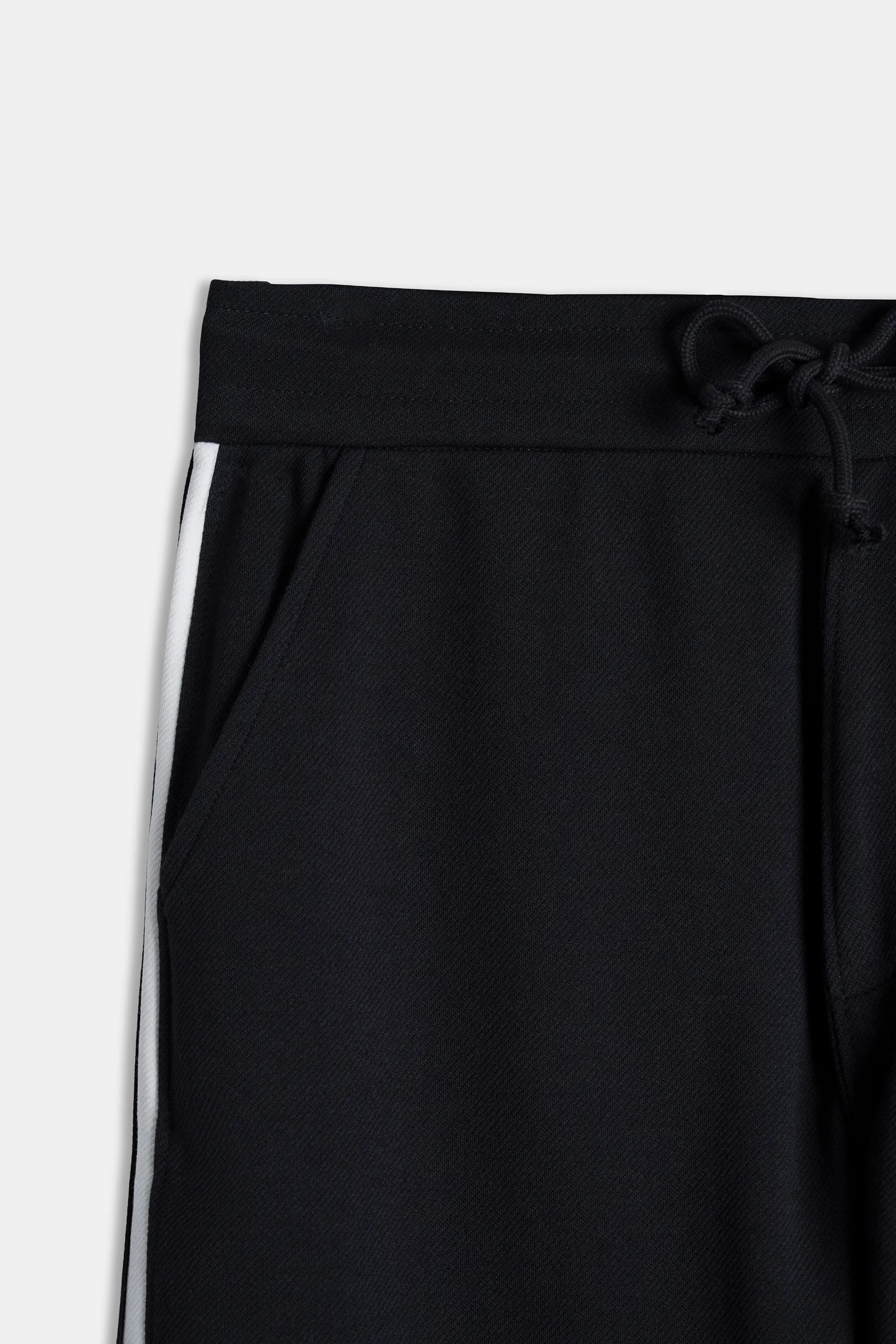 Black trousers waistband with drawstring and elastic casing