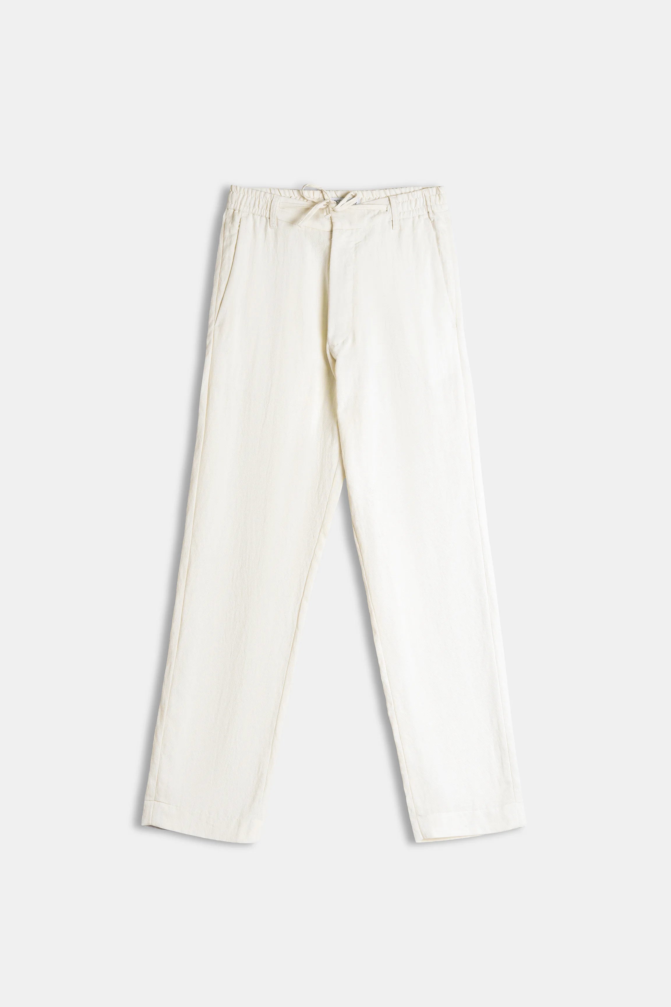 Off-white straight-leg pants with drawstring waist and cuffed hem
