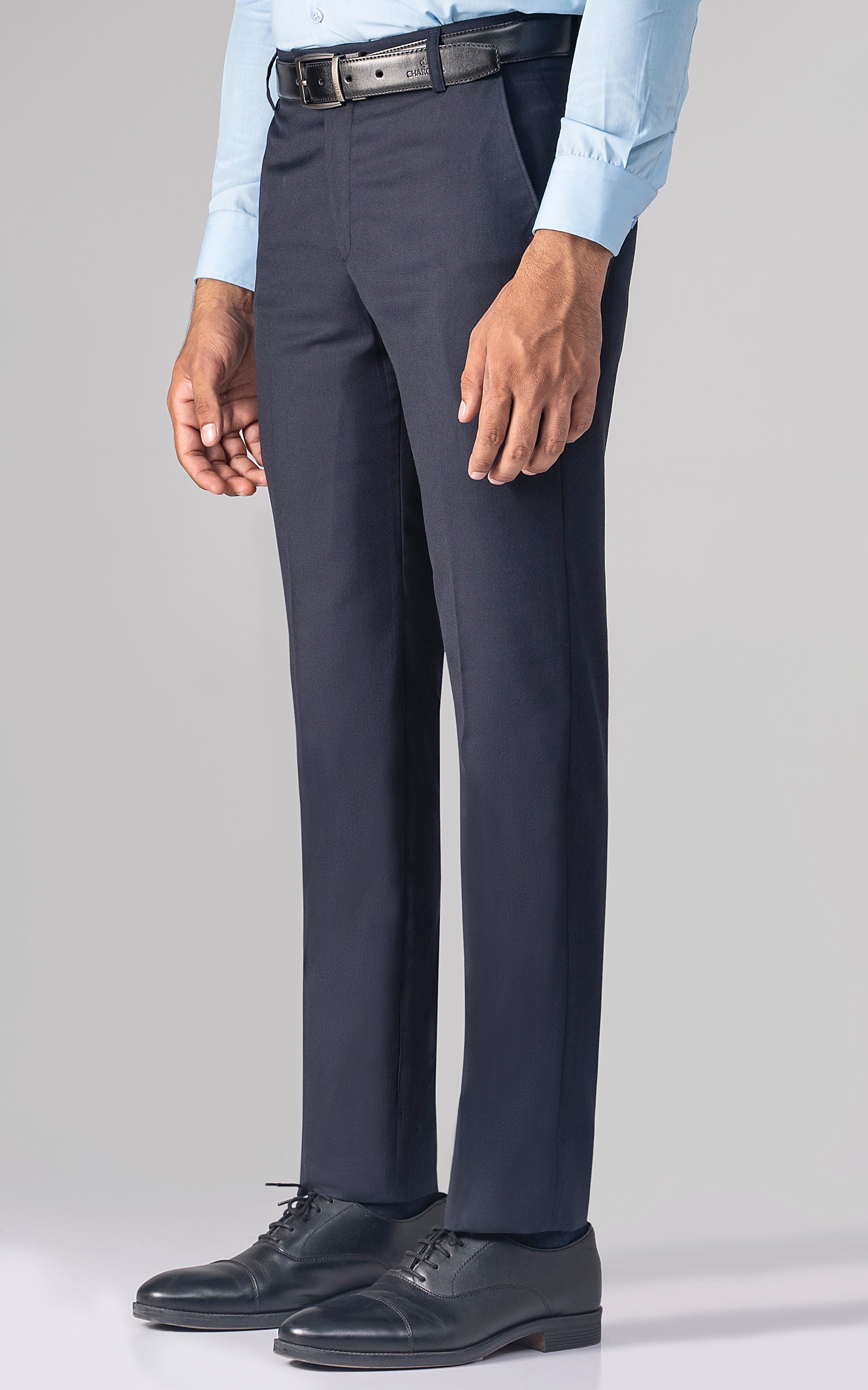 Navy dress pants with belt loops, pleated front, and straight legs