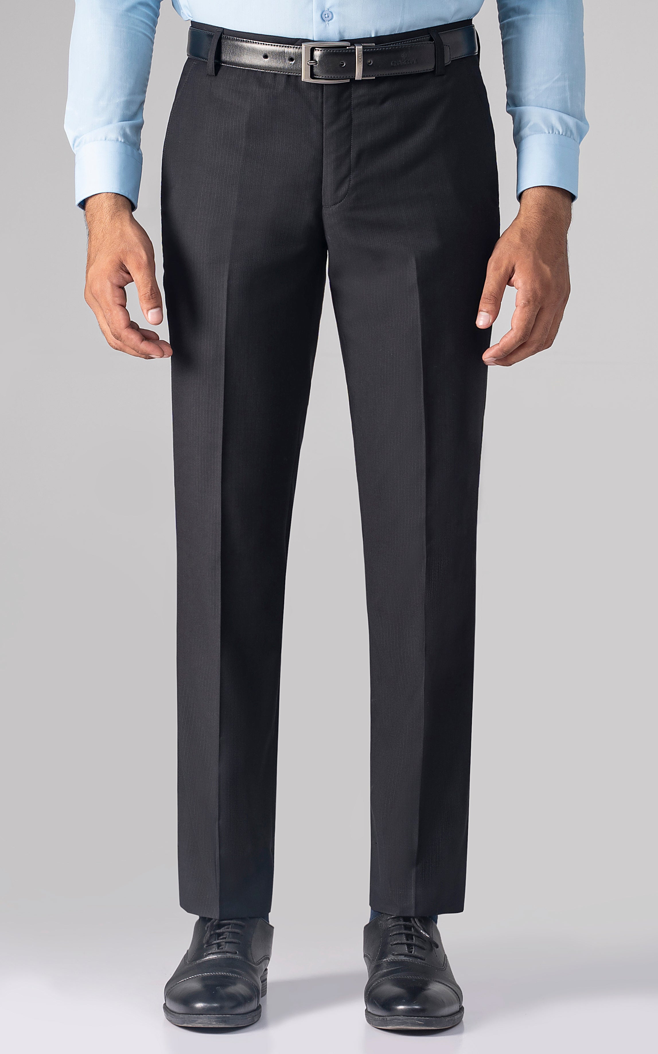 Black dress pants with belt loops, front button, and straight legs