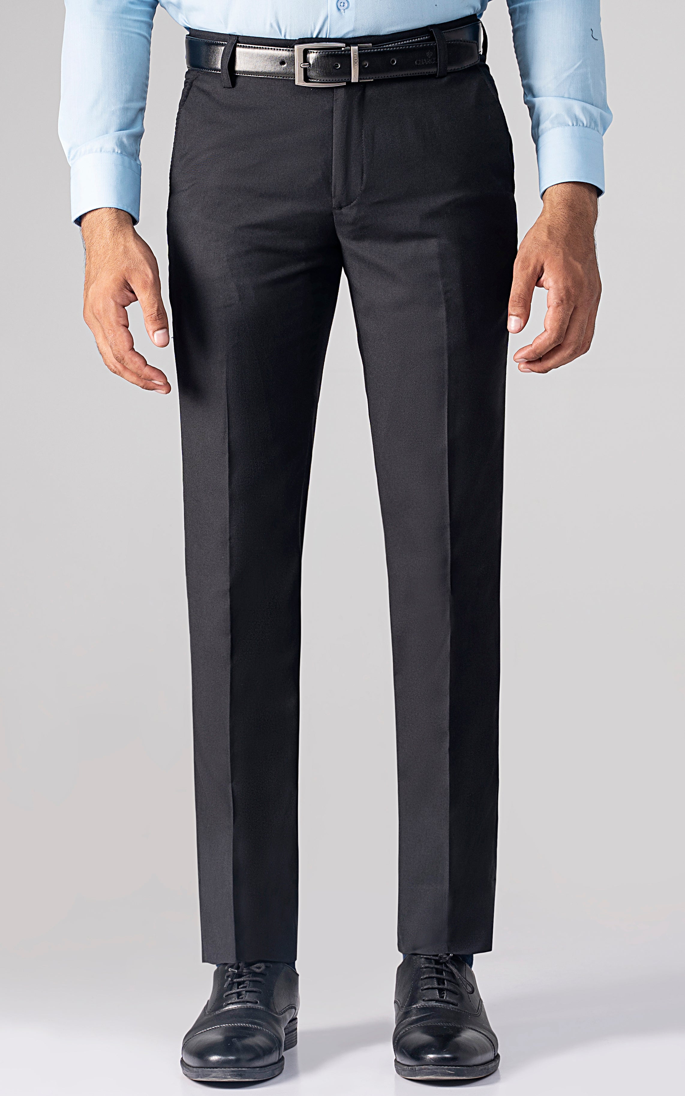 Black dress pants front view with belt loops and straight, tapered legs
