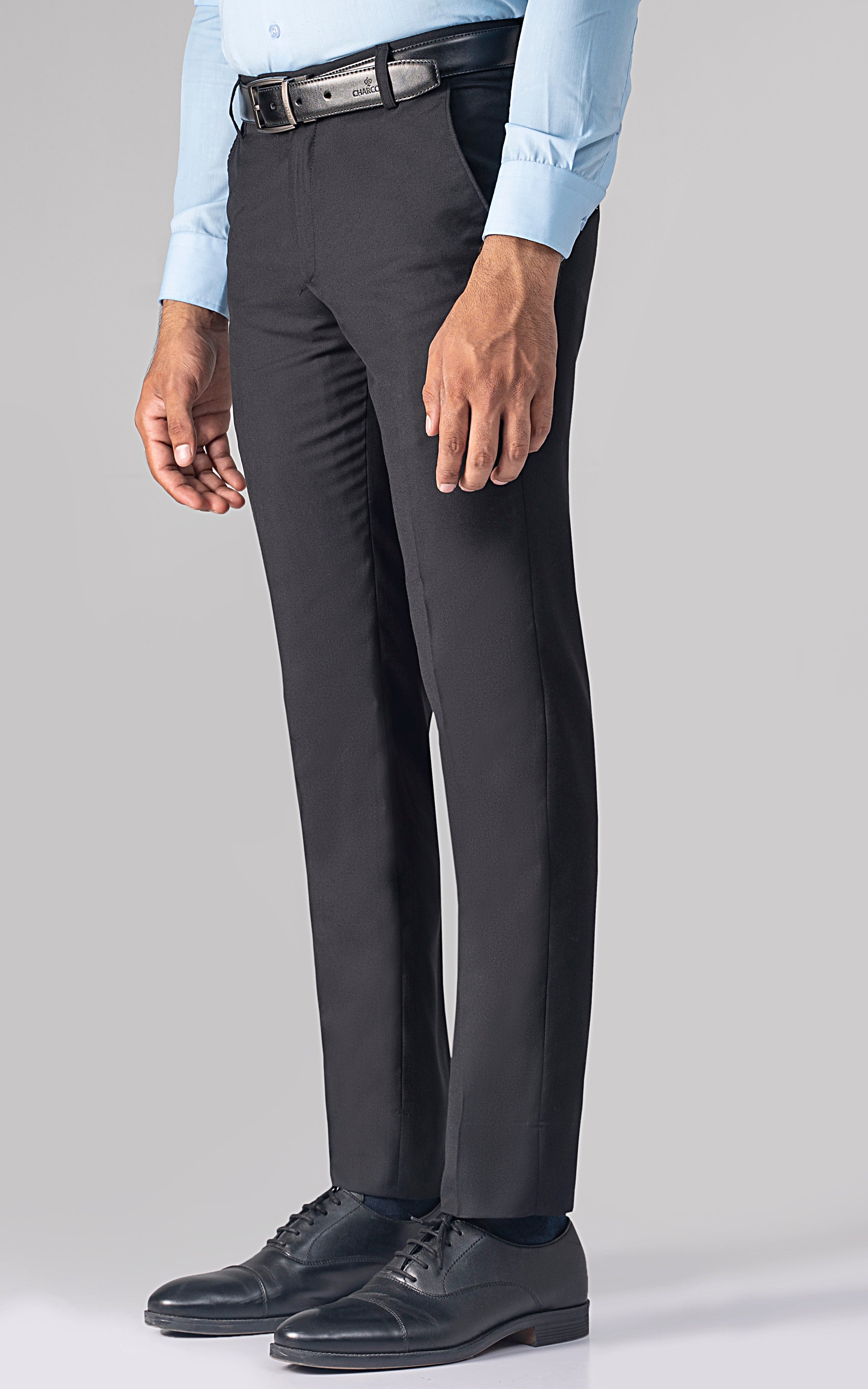 Black dress pants with belt loops, zip fly, and straight leg fit