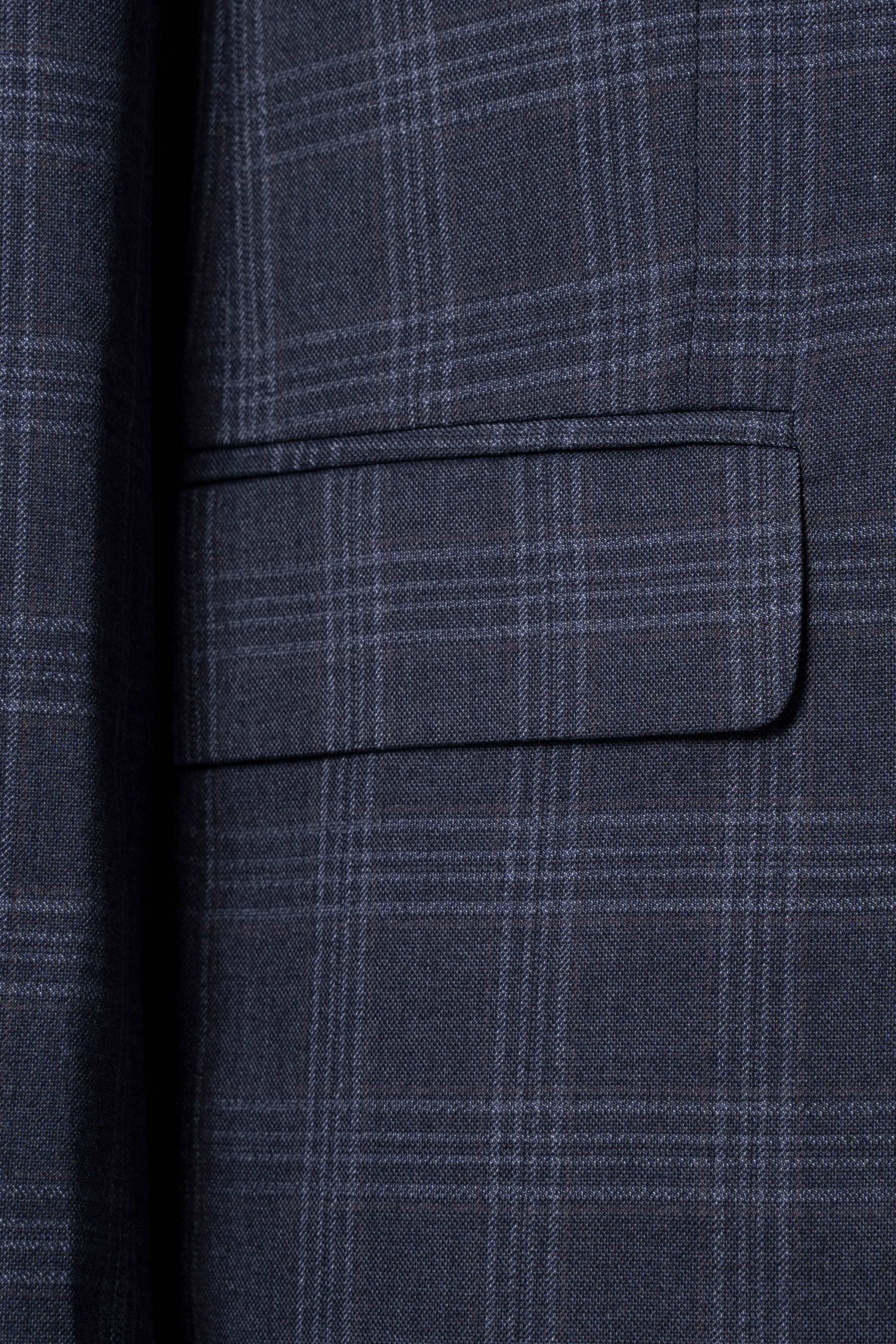 Blue-gray plaid suit jacket front flap pocket detail