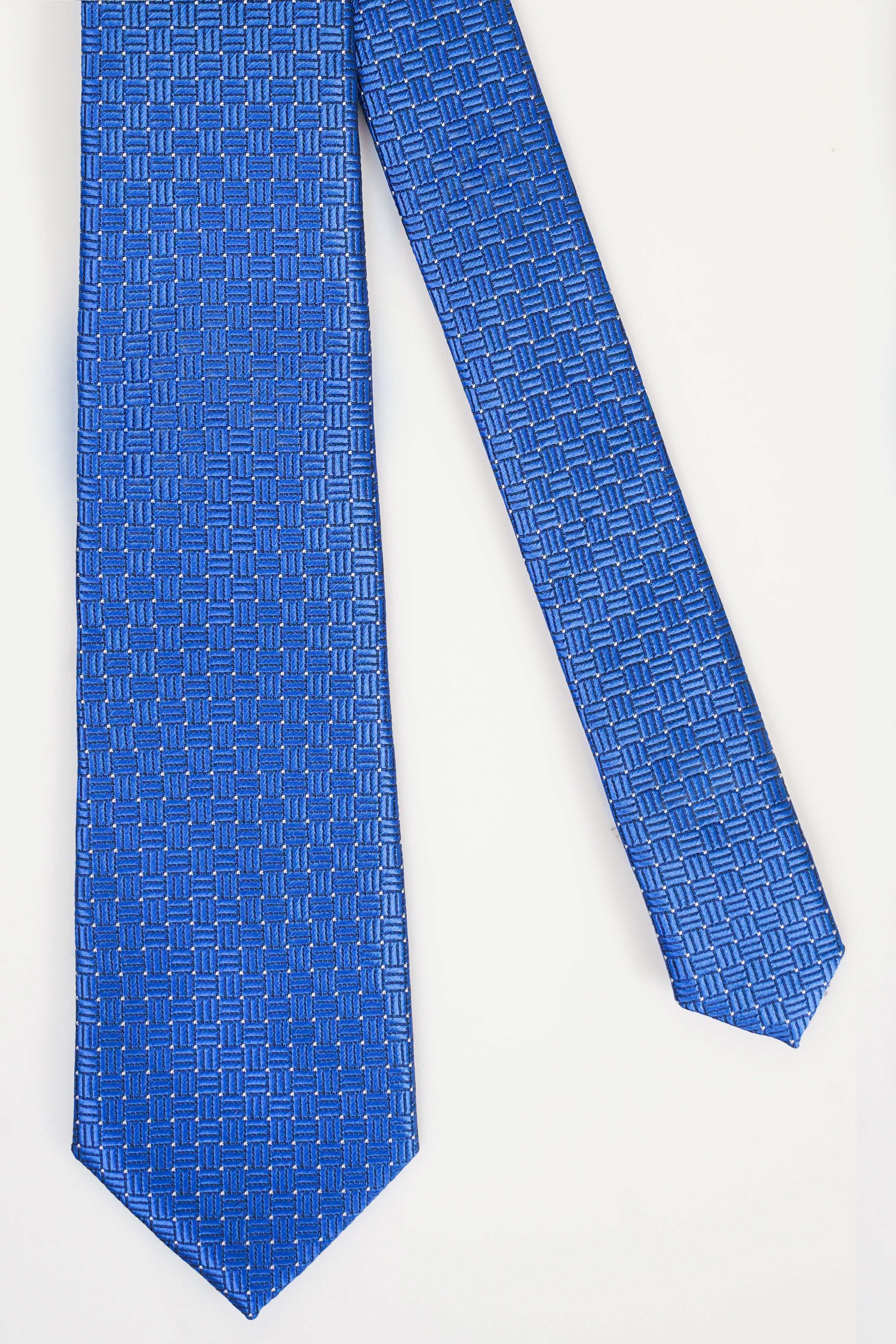 Blue patterned necktie with small geometric repeat, long pointed end