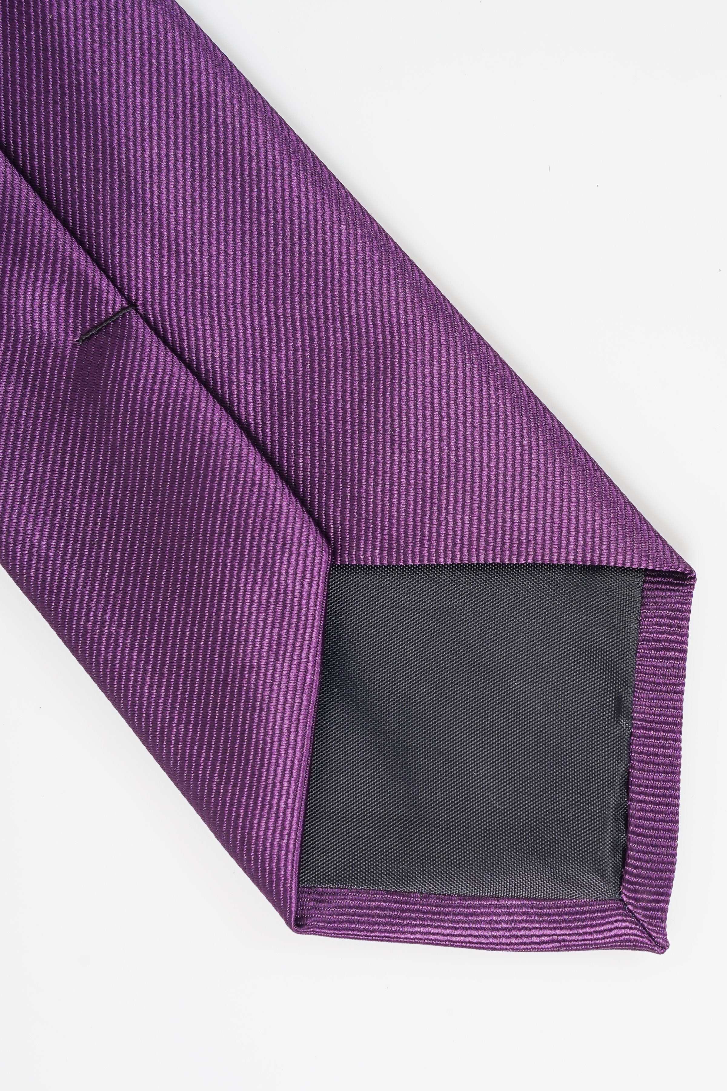 Purple necktie tip with woven texture and dark inner lining