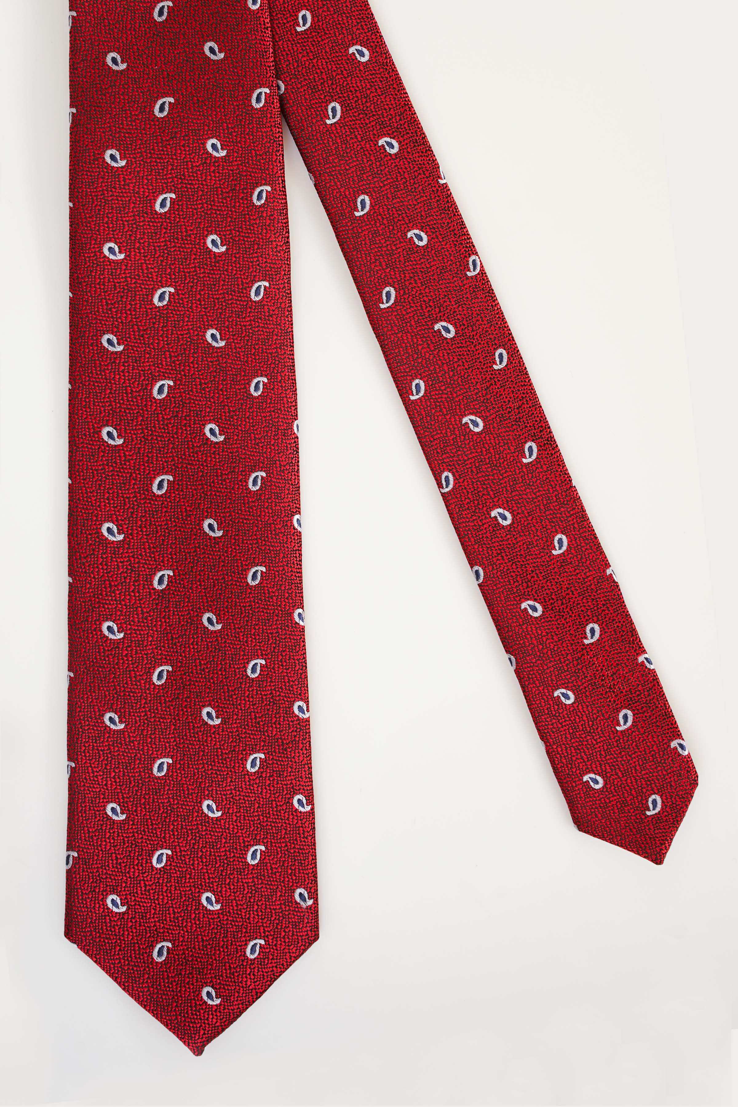 Red necktie with repeating blue teardrop motifs, straight hanging view