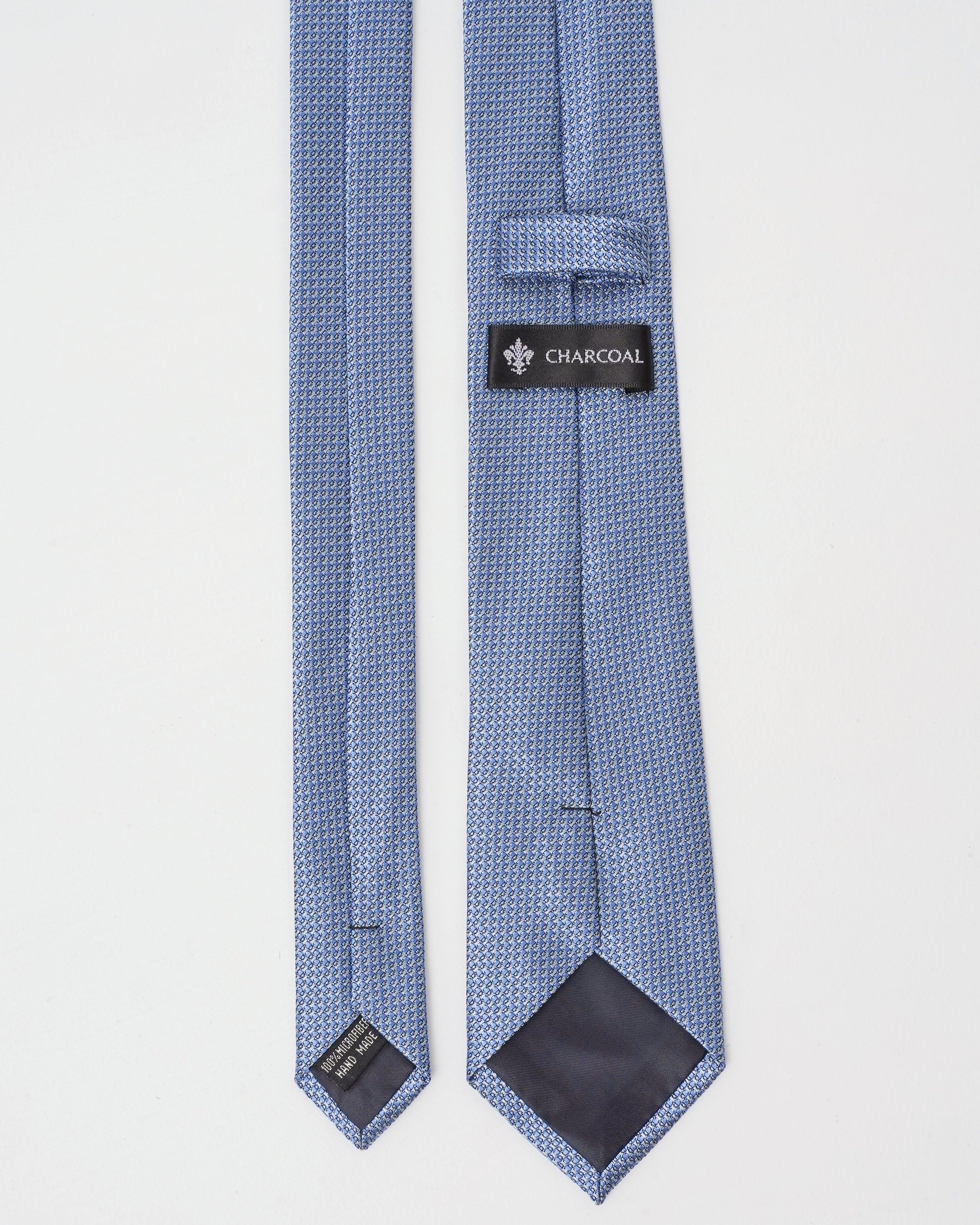 Blue necktie with woven texture and CHARCOAL label