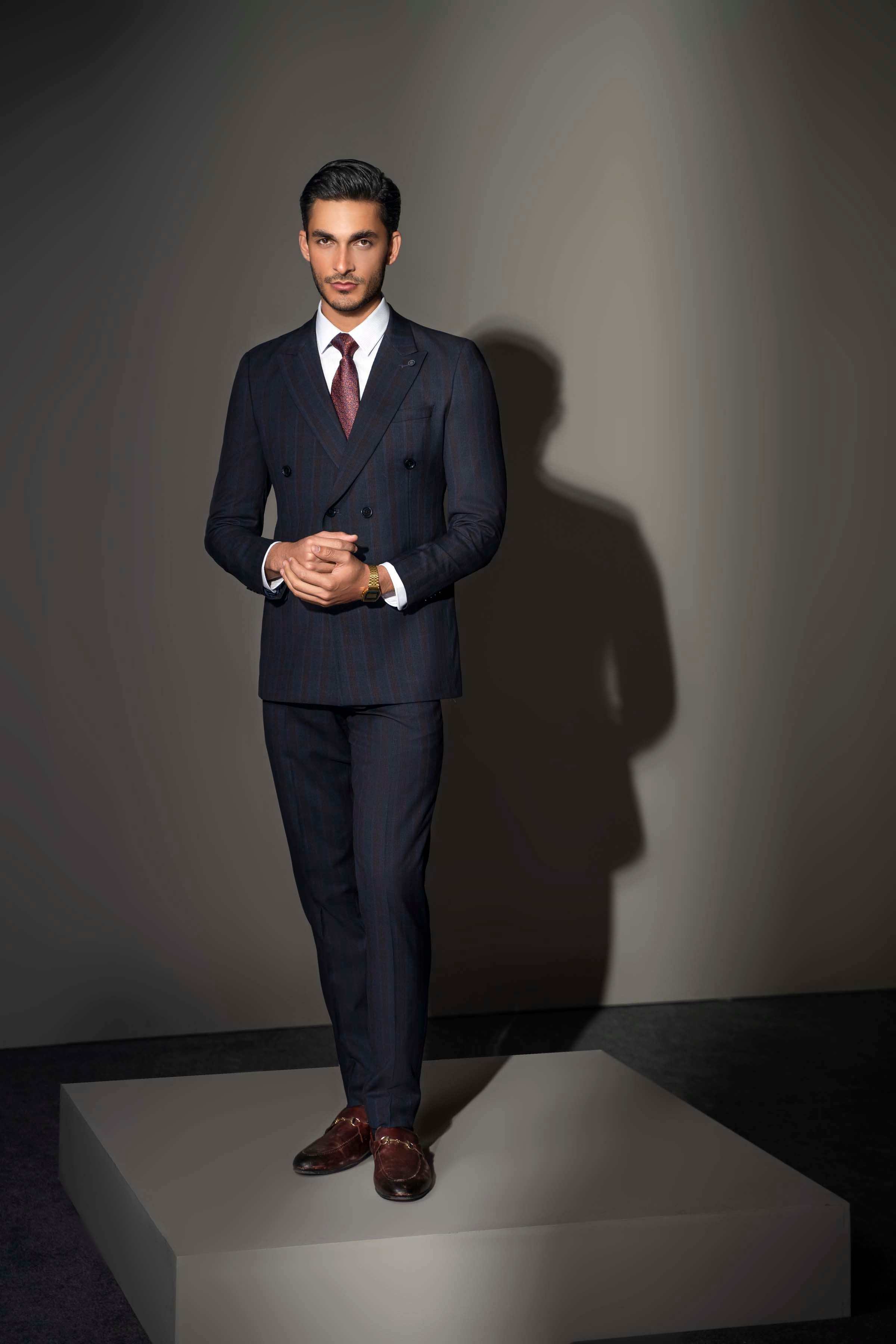 Navy check double-breasted suit with notch lapels and matching trousers
