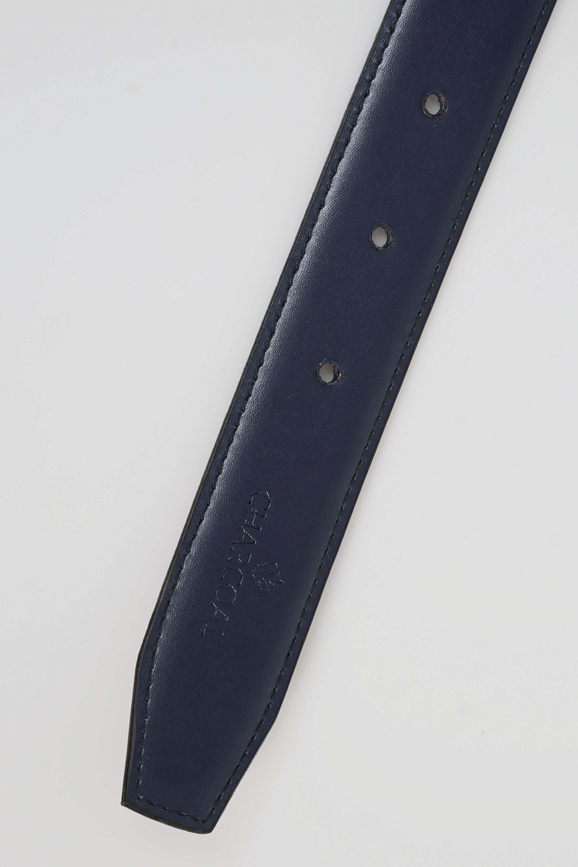 Dark navy leather belt strap with stitched edge and metal eyelets