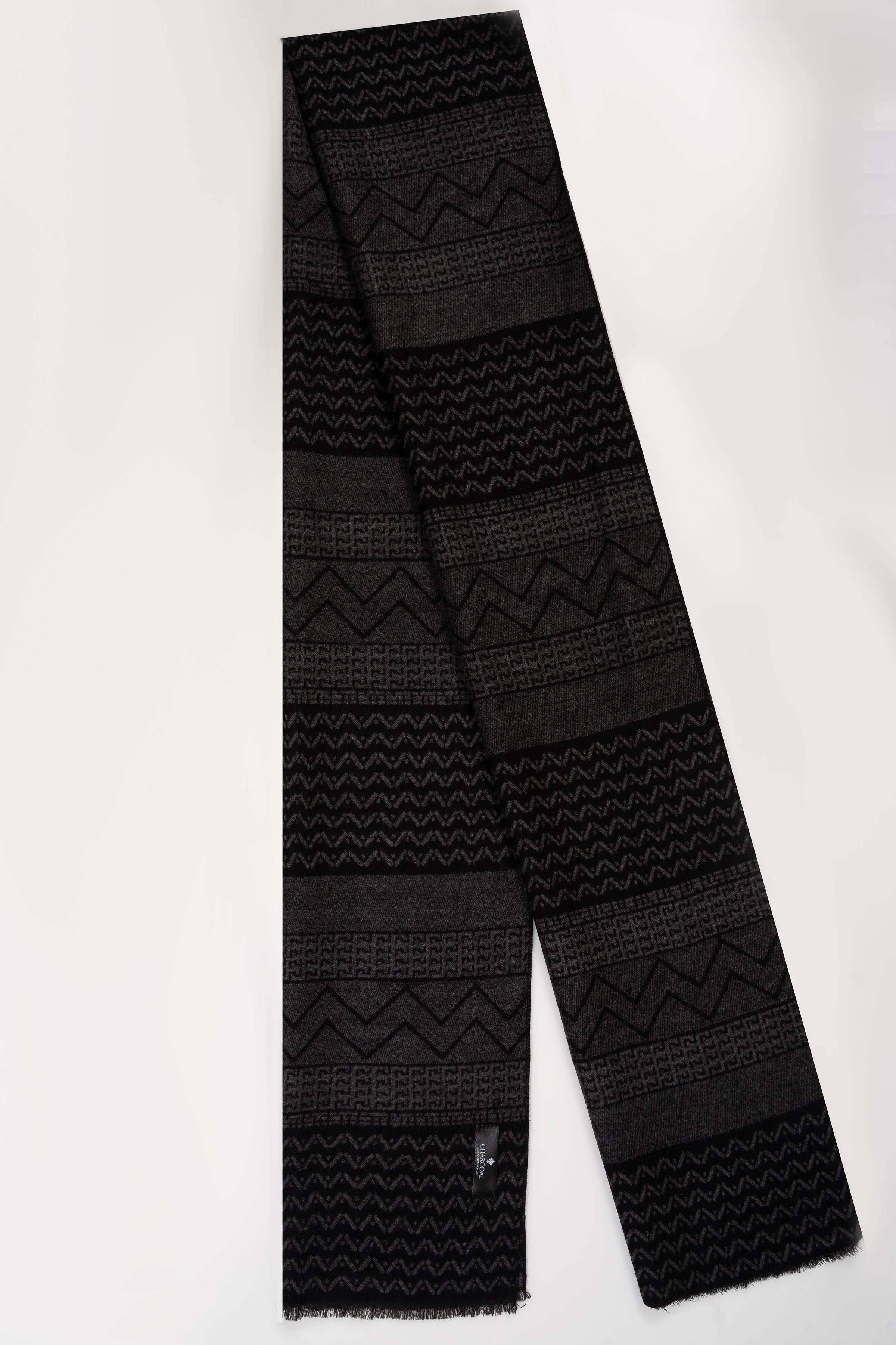 Black scarf with vertical patchwork blocks of zigzag and stripe patterns
