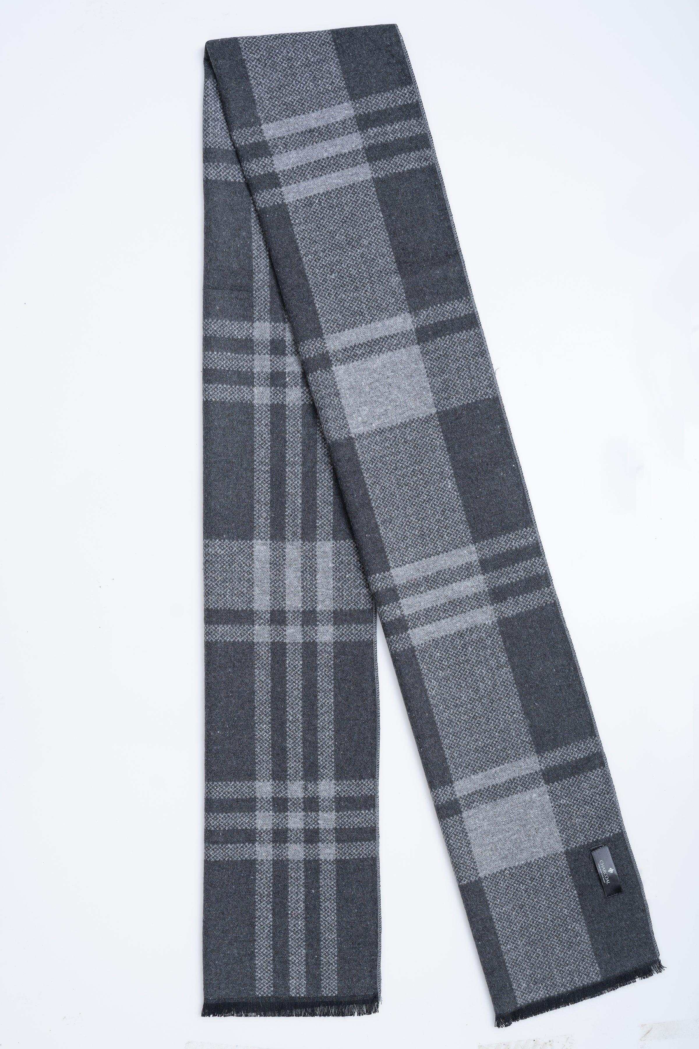 Dark gray plaid scarf with fringe ends, folded and draped