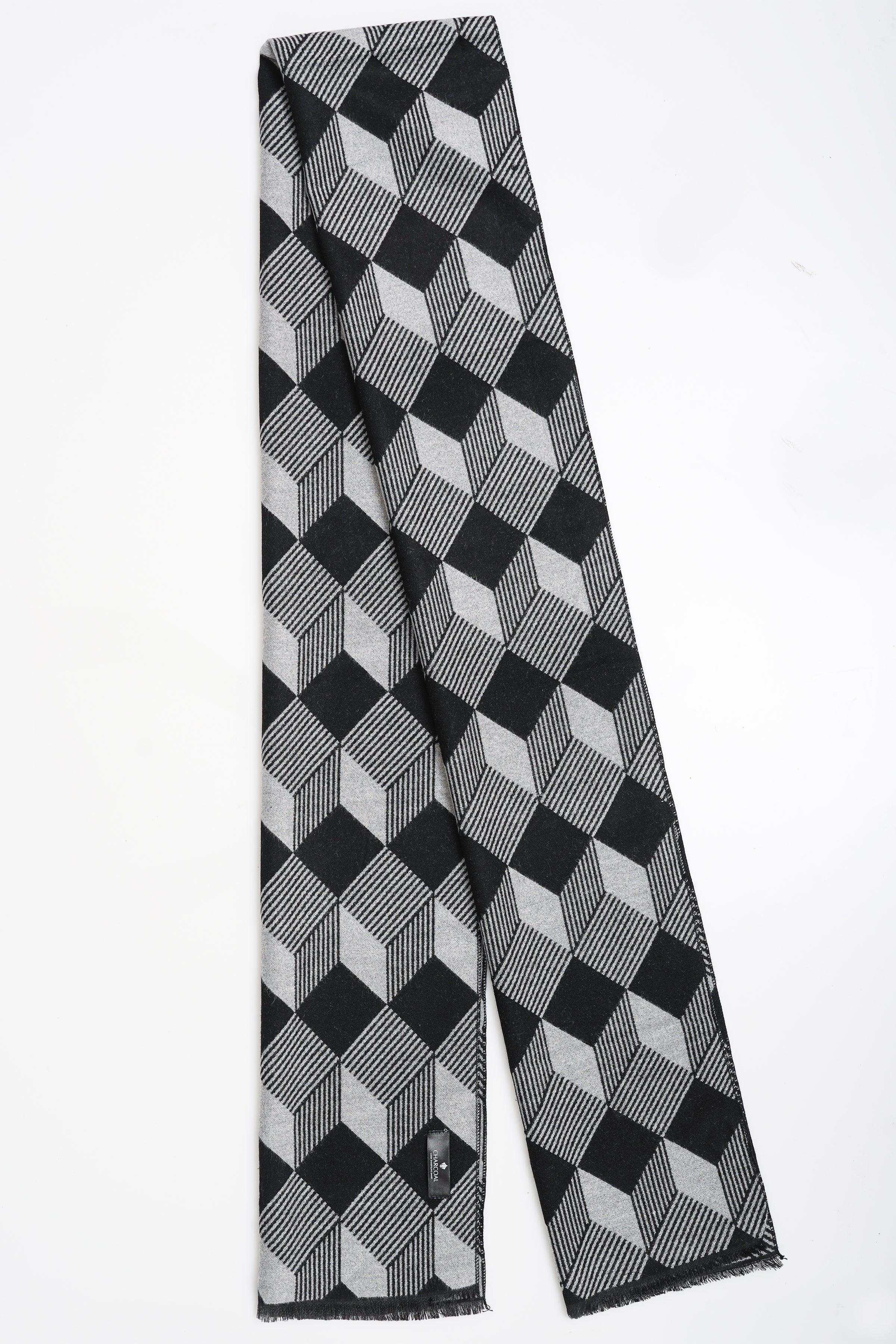 Black and white plaid scarf draped on one end