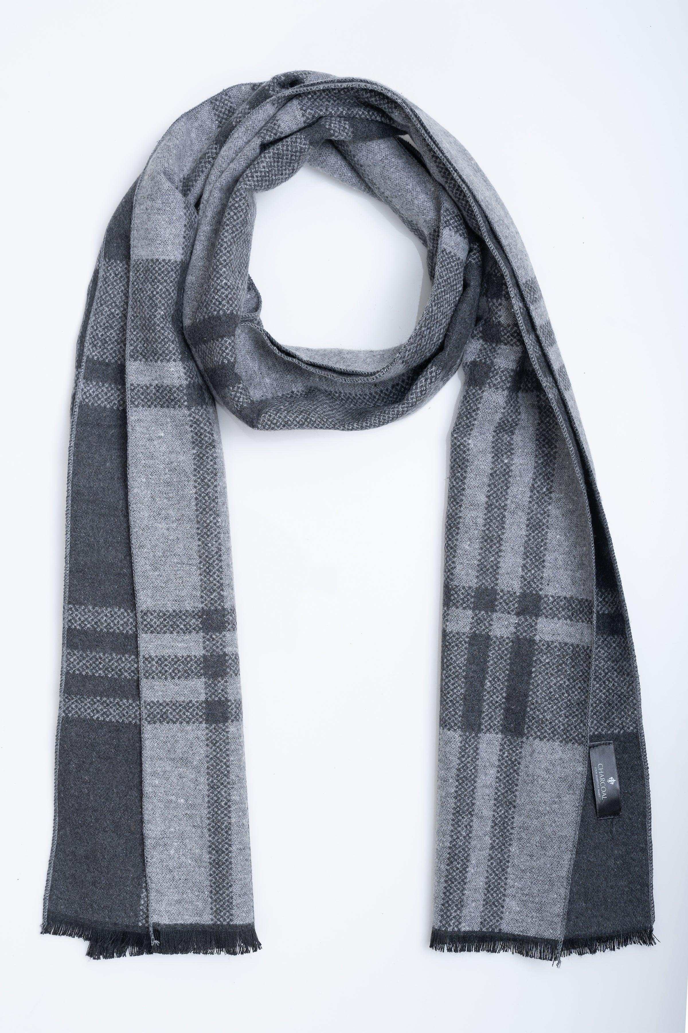 Dark gray plaid scarf with fringe ends, draped in a loop