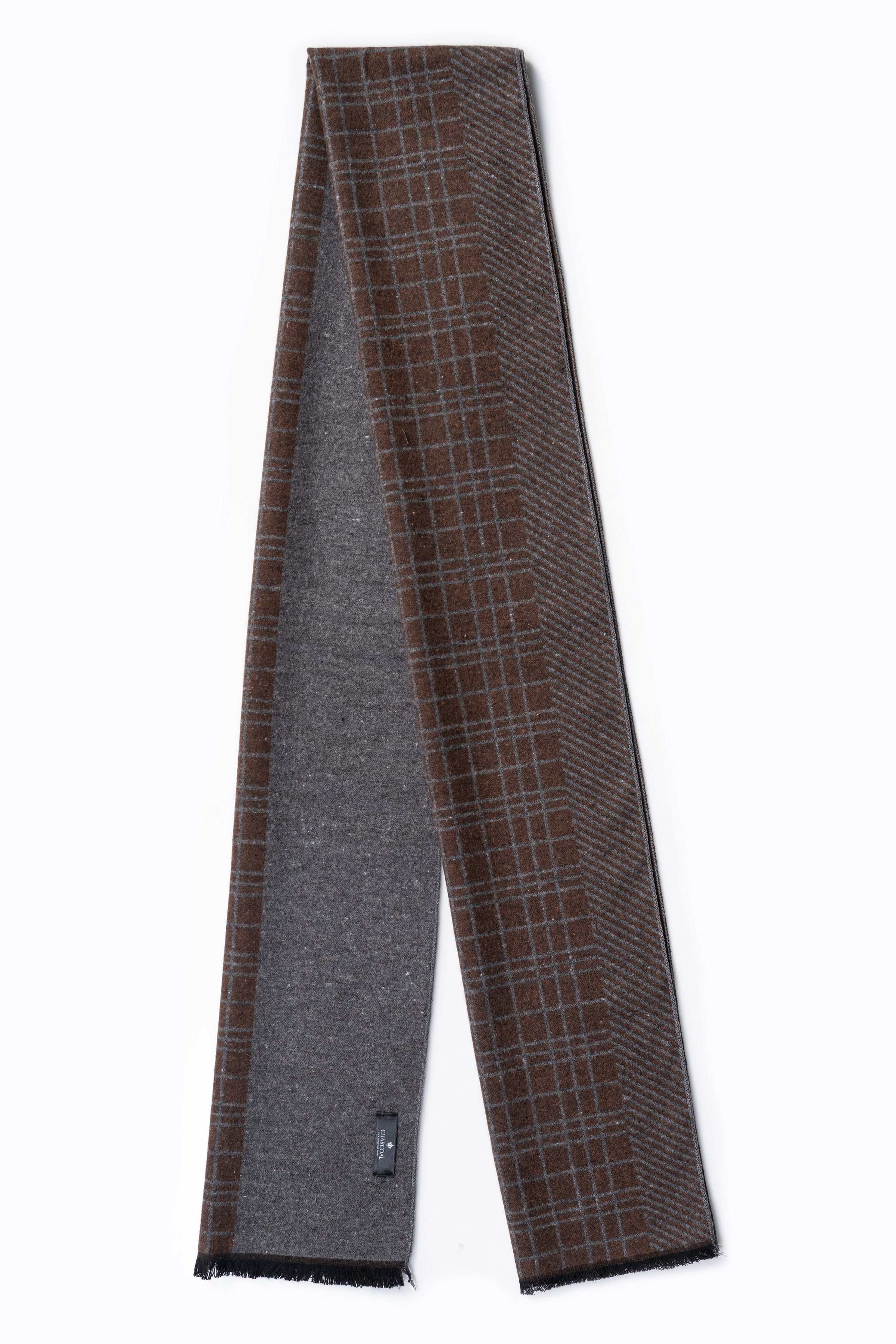 Windowpane plaid scarf with dark solid side panels and long fringe edges