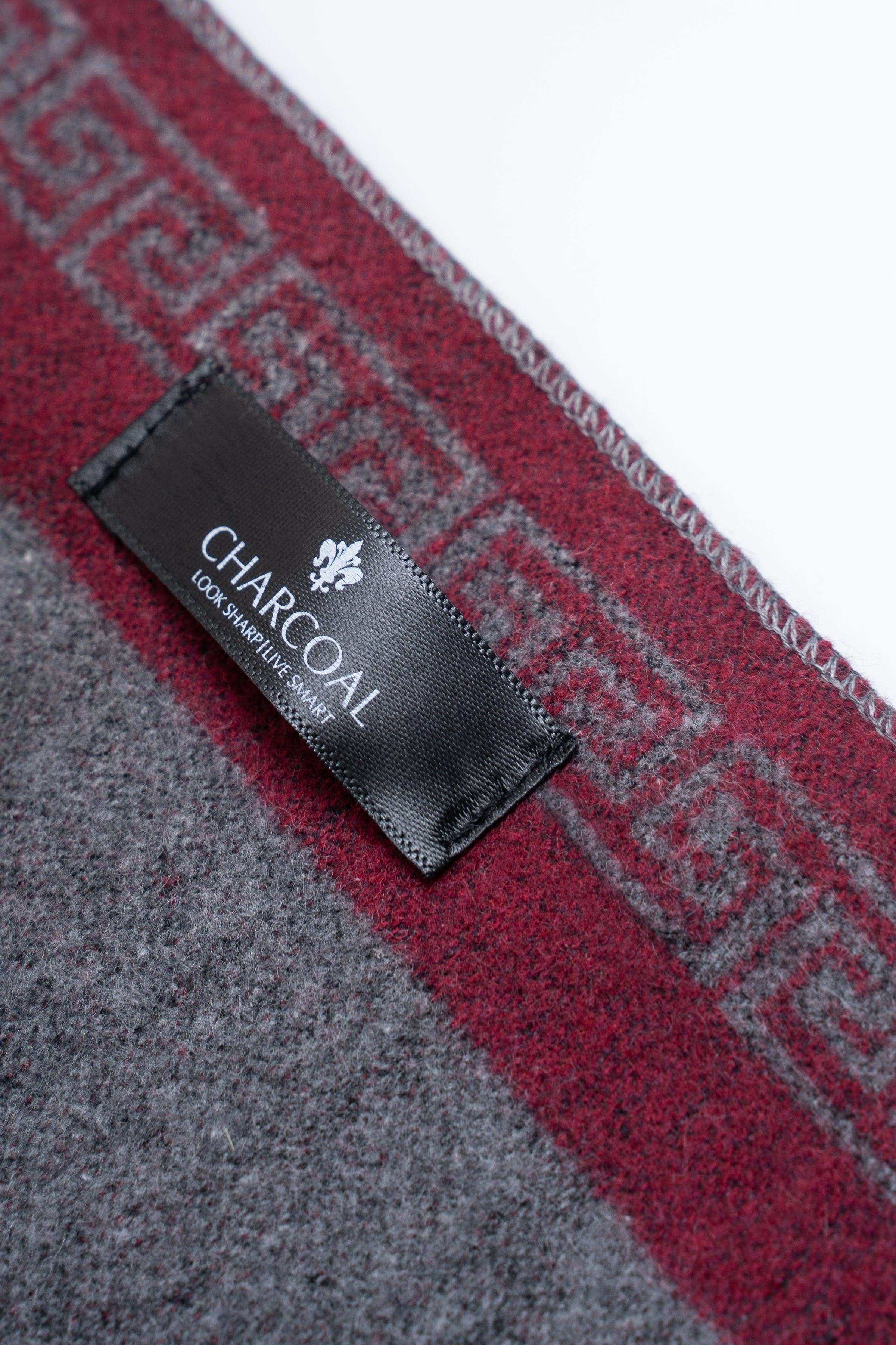 Scarf with CHARCOAL label on red-and-gray woven border stripe