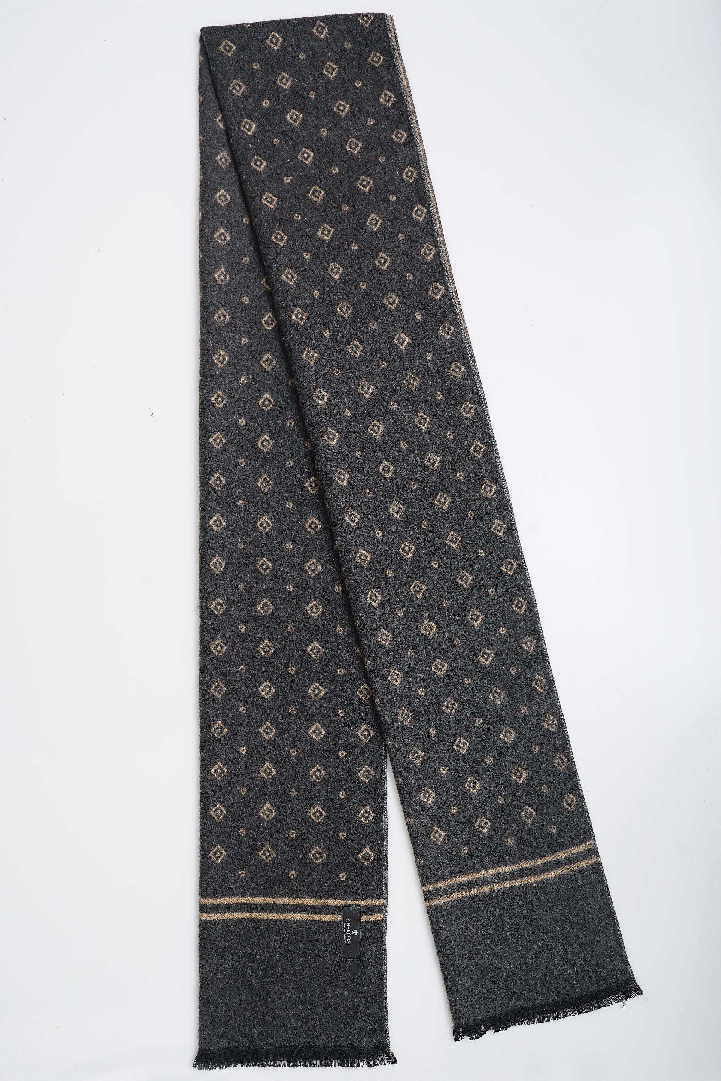 Dark patterned scarf with tan micro-geo repeat, border stripe and fringed hem